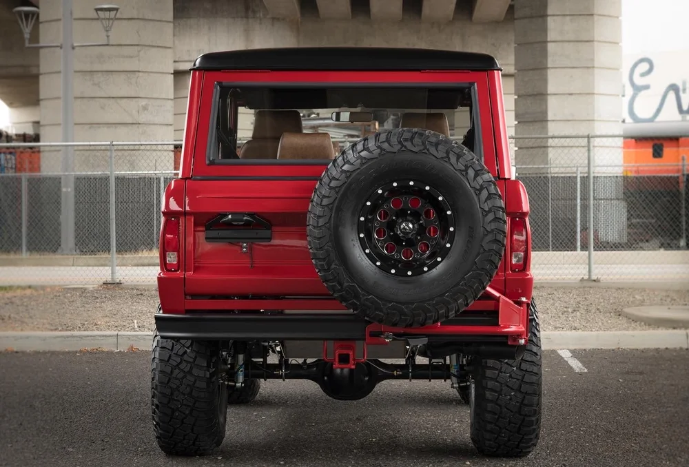 Rear tire carrier with matching spare