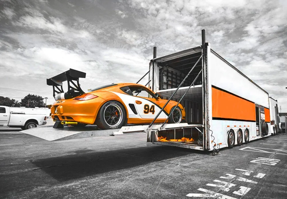 Sports car being loaded for vehicle transportation