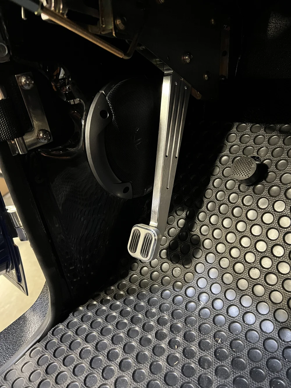 Driver side speaker pod