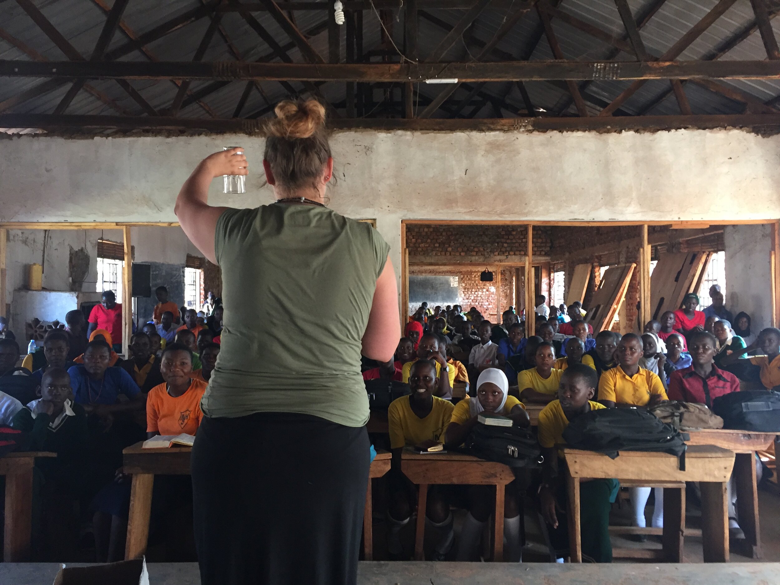 Aly speaking at a high school fellowship, Jinja, Uganda