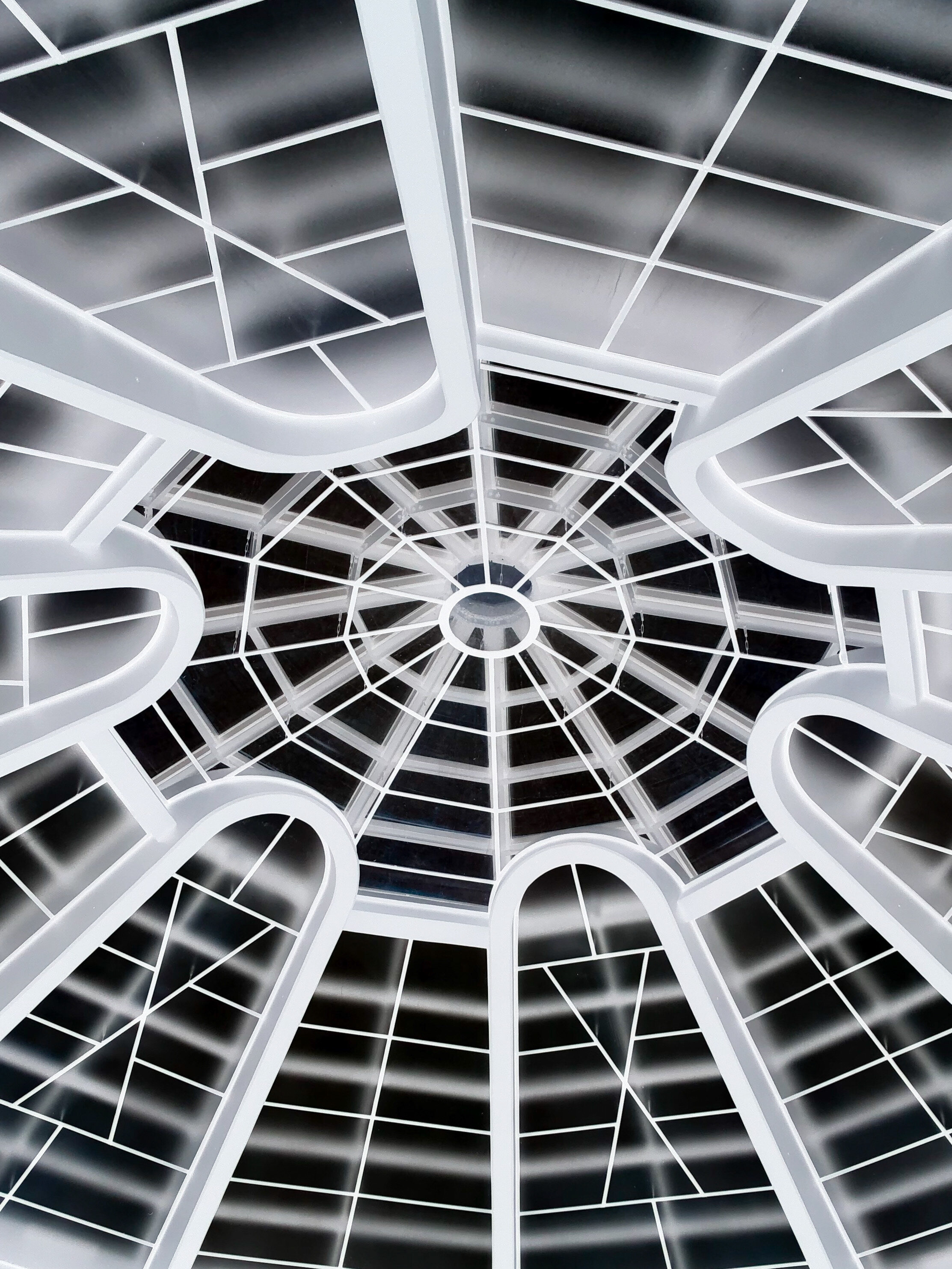 Black and white, inverted photograph of the ceiling of the the Solomon R. Guggenheim Museum, New York, New York, U.S.A. Cyber gothic aesthetic.