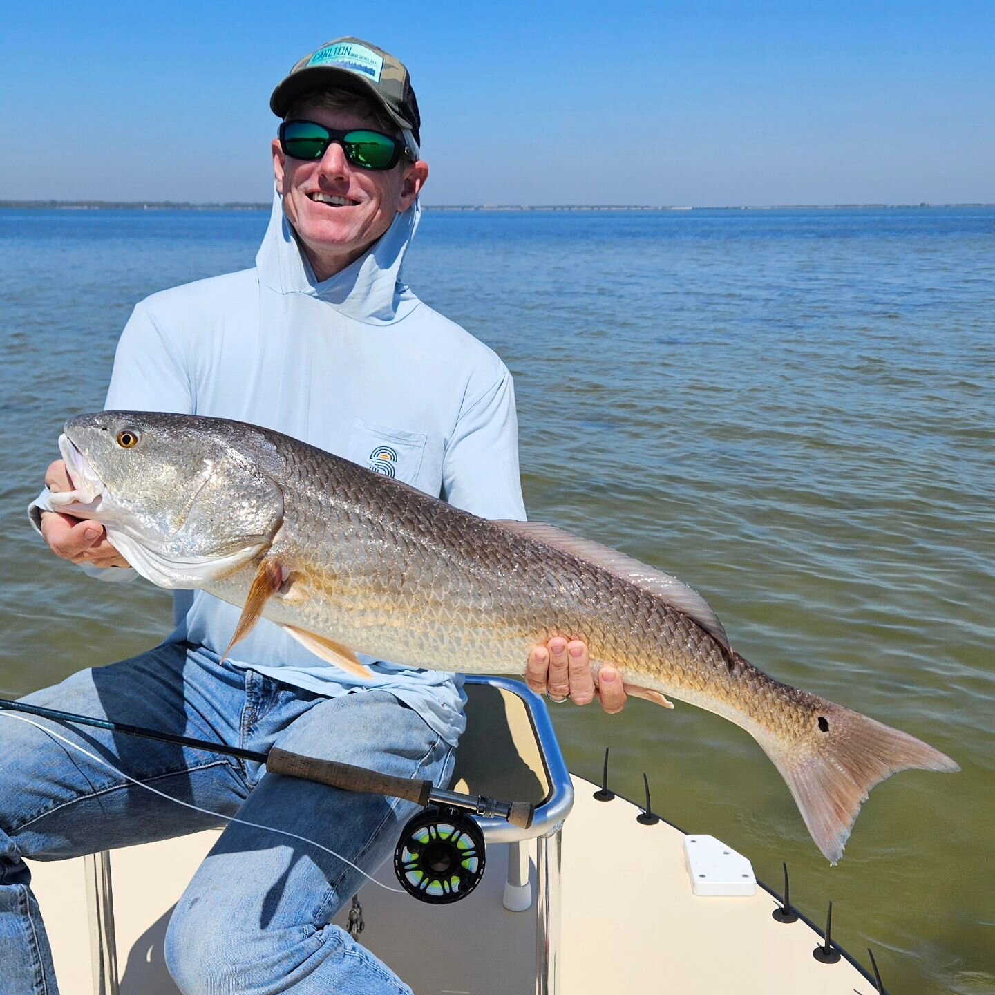 Travis with a quality #redfishonfly today.
