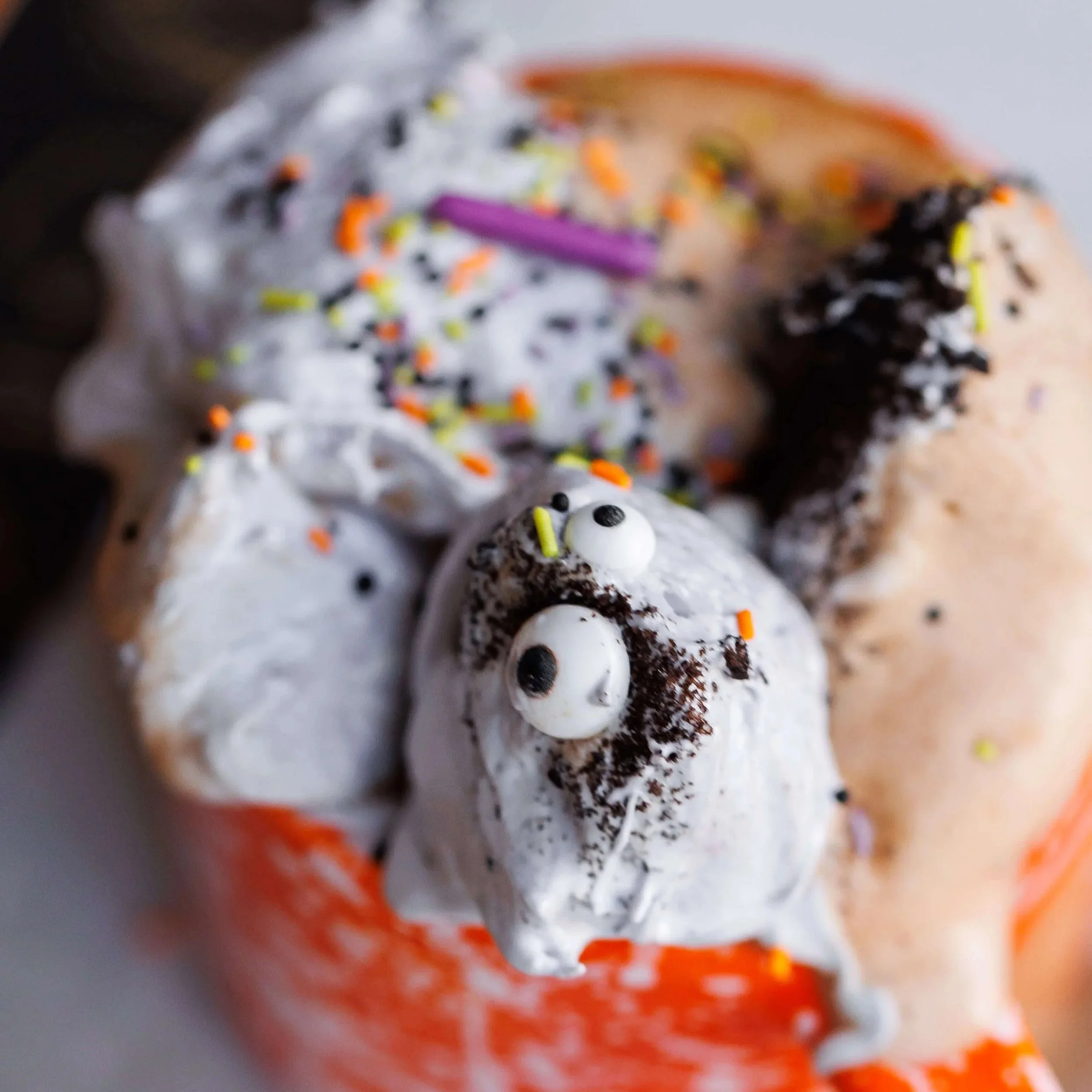 close-up-monster-marshmallow-fluff-on-hot-chocolate-in-orange-mug.jpg