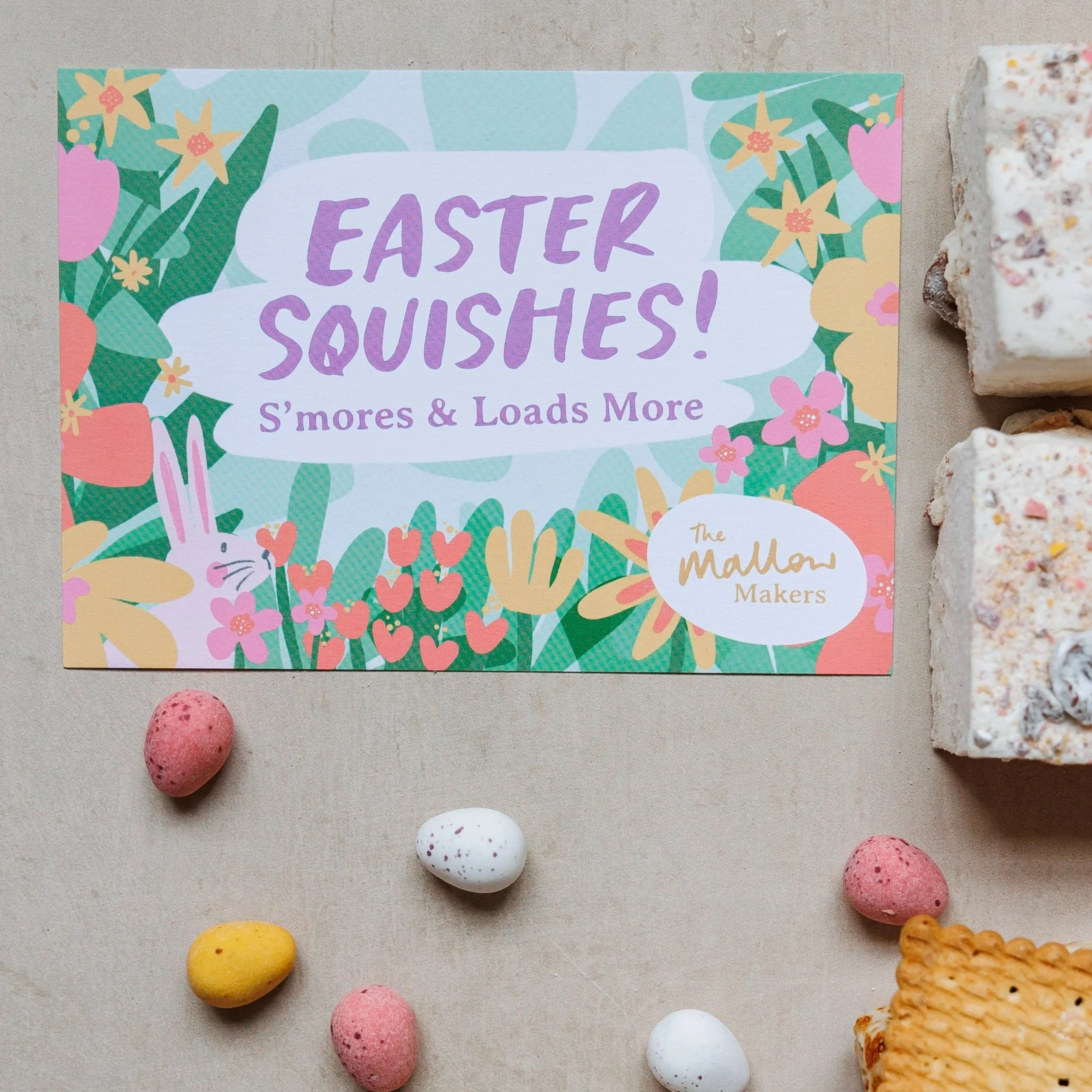 looking+down+on+an+illustrated+postcard+of+Easter+Squishes+surrounded+by+cadbury+mini+eggs+and+marshmallows.jpg