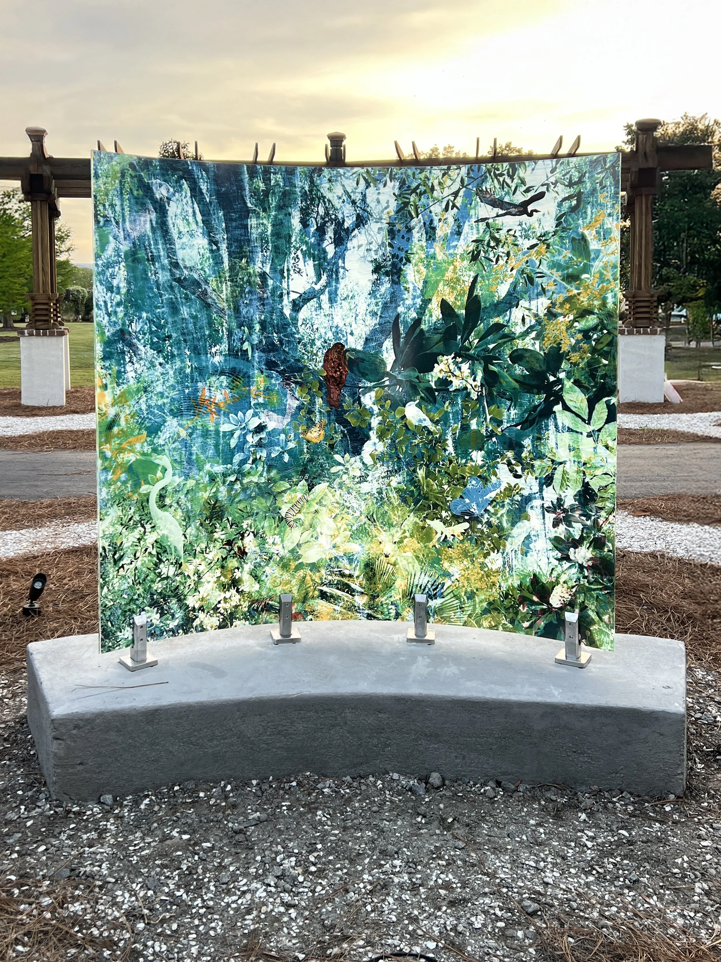 MARITIME FOREST, photographic composite embedded in curved glass, 60 x 72 x 12 in, 2025. The work honors the magnolias, loblolly pines, live oaks, spanish moss, saw palmettos, owls, and hawks that define the inland wilds of the island.