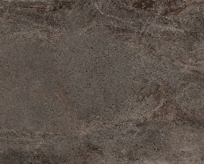 Laminam dark porcelain countertop and backsplash material. Image from Quartz Co Surfaces Niagara countertop company near Toronto