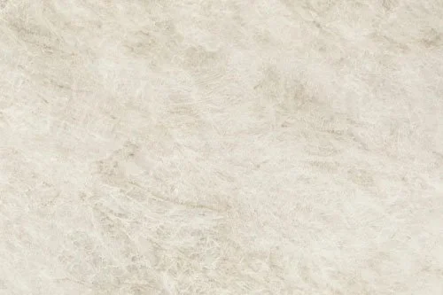  Hanstone Taj Mahal - Silk Finish - 1.2cm (12mm) 
An ivory backdrop with fine golden and taupe veining in natural, irregular patterns, creating a warm, refined look with elegant depth and movement.