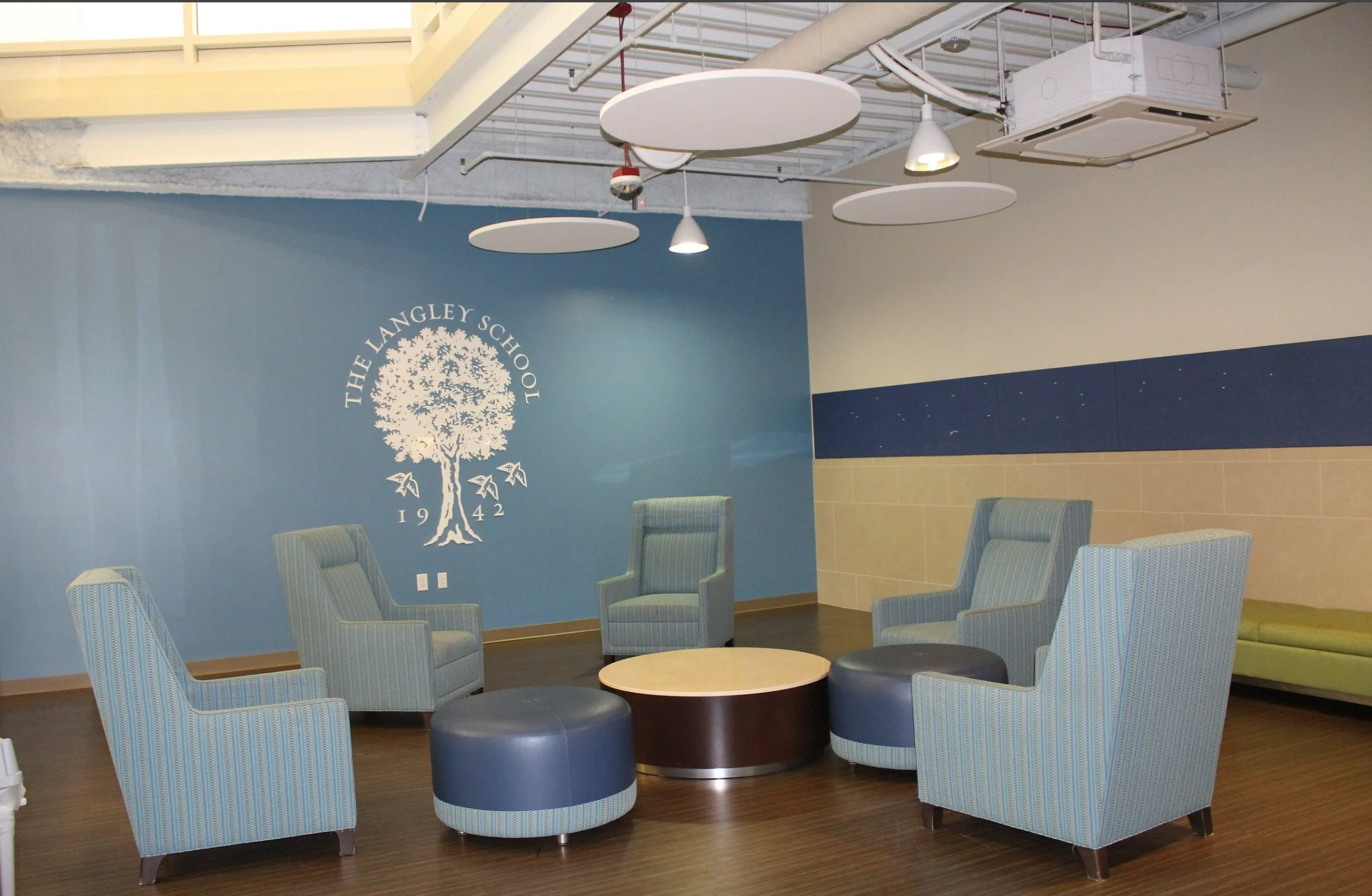 Breakout area with chairs and endtables