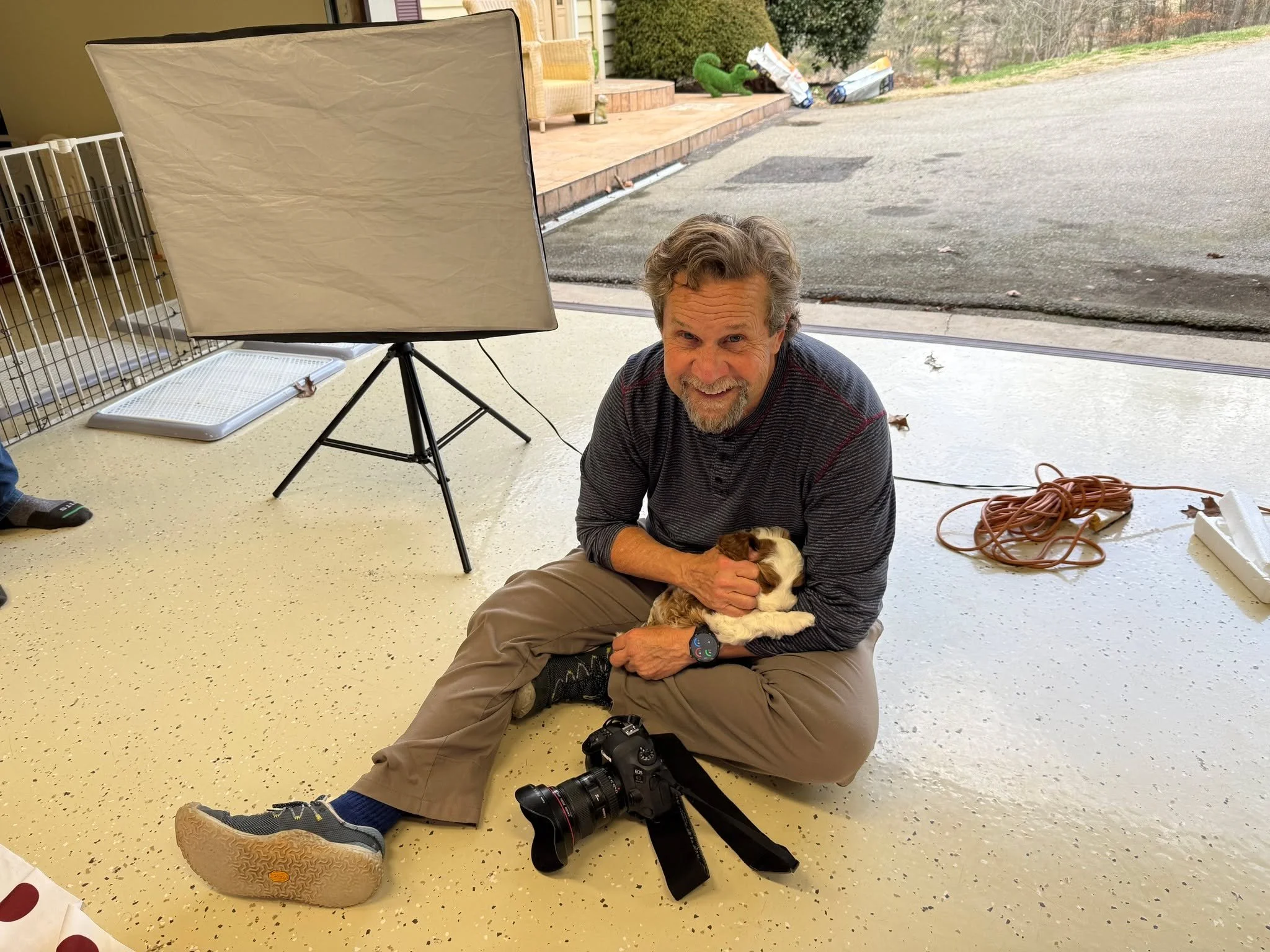 Stan taking a break with Dino, one of Carmella's 6 week old puppies. He is our go-to photographer when we need  polished photos and video of our pups - and he always delivers. Puppy cuddling is just an added bonus of the job! 😉 

See Stan's own crea