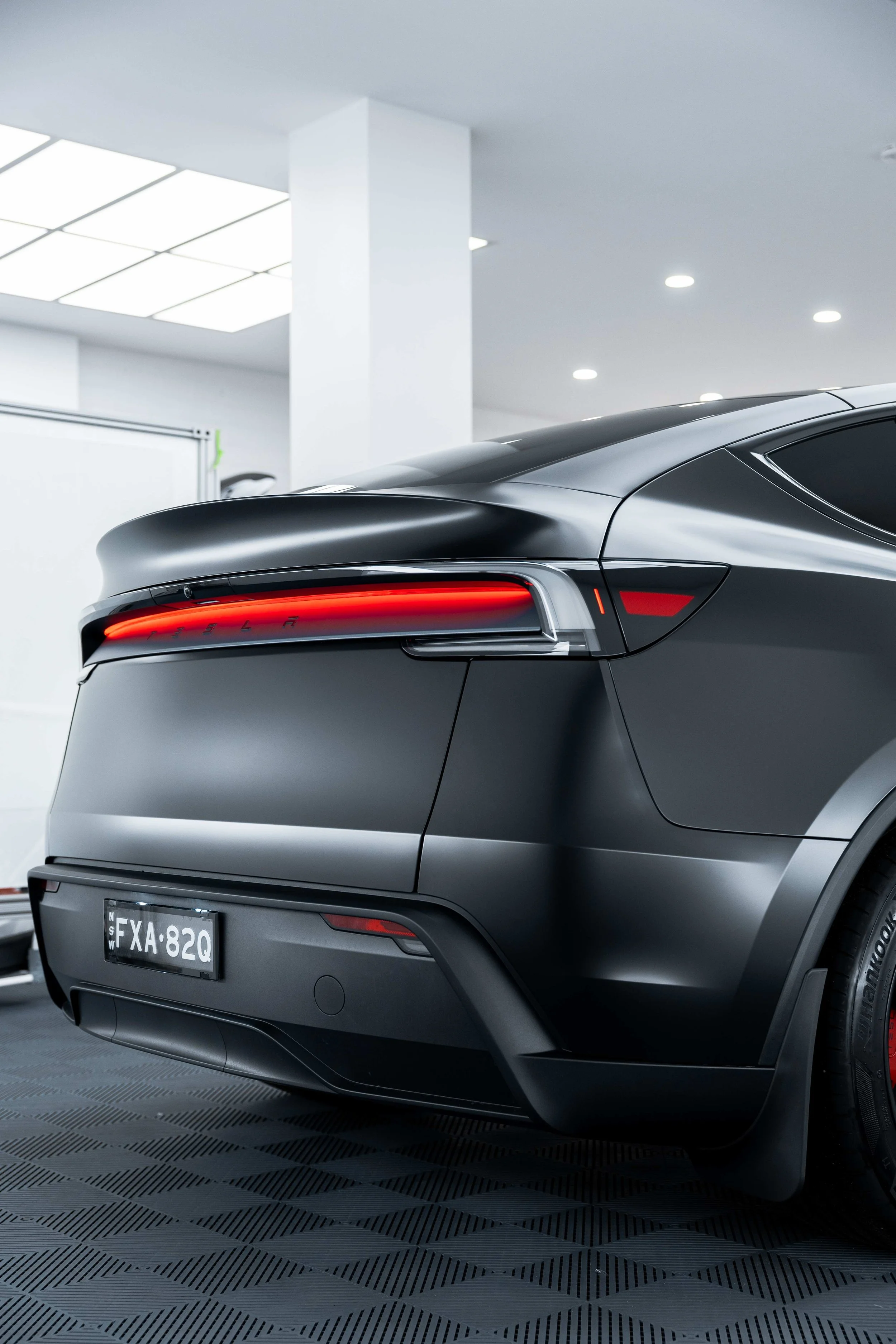 Matte black Tesla Model Y rear end with XPEL Stealth Paint Protection Film in Sydney