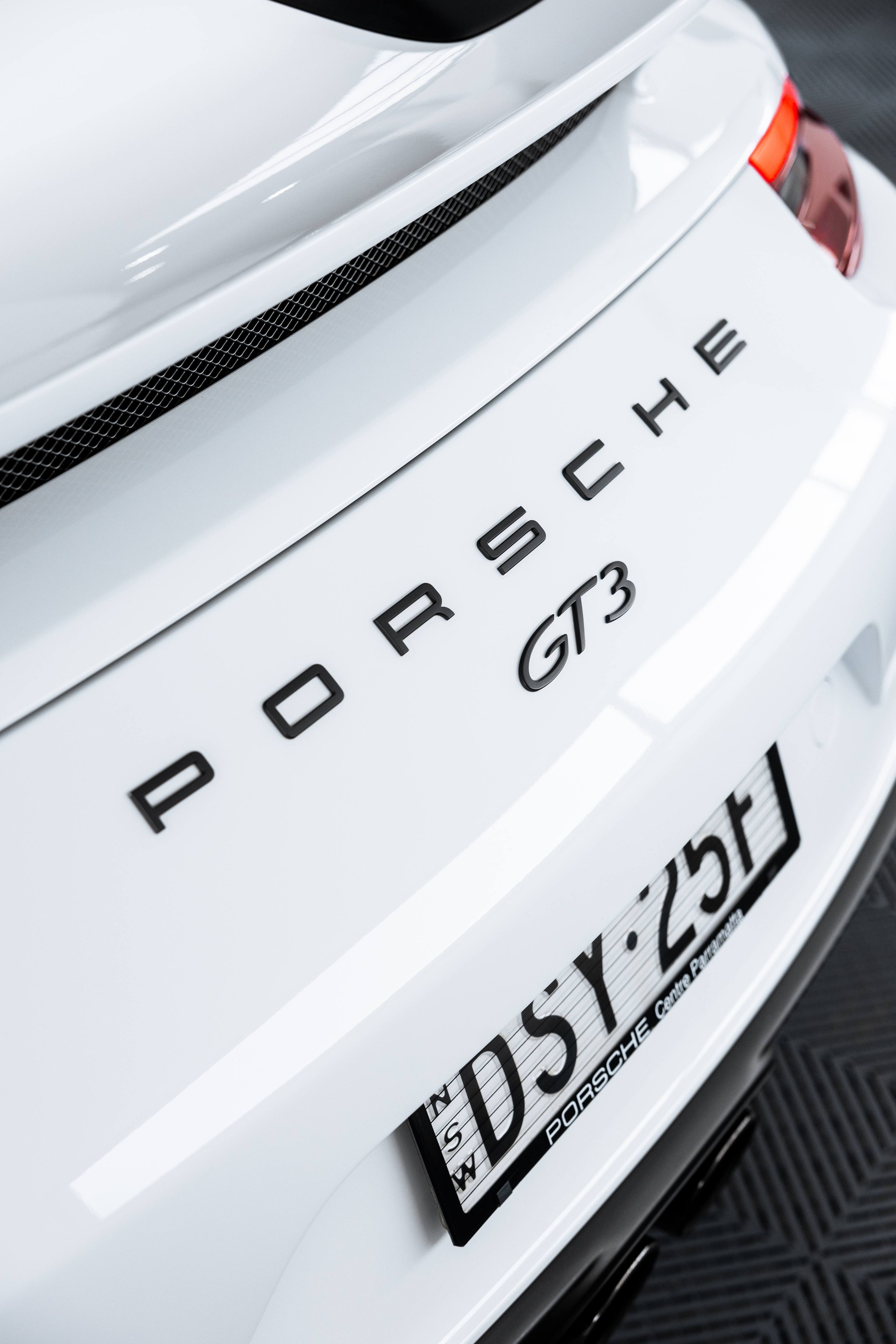 White Porsche GT3 rear badge and GT3 lettering with XPEL Paint Protection Film in Sydney