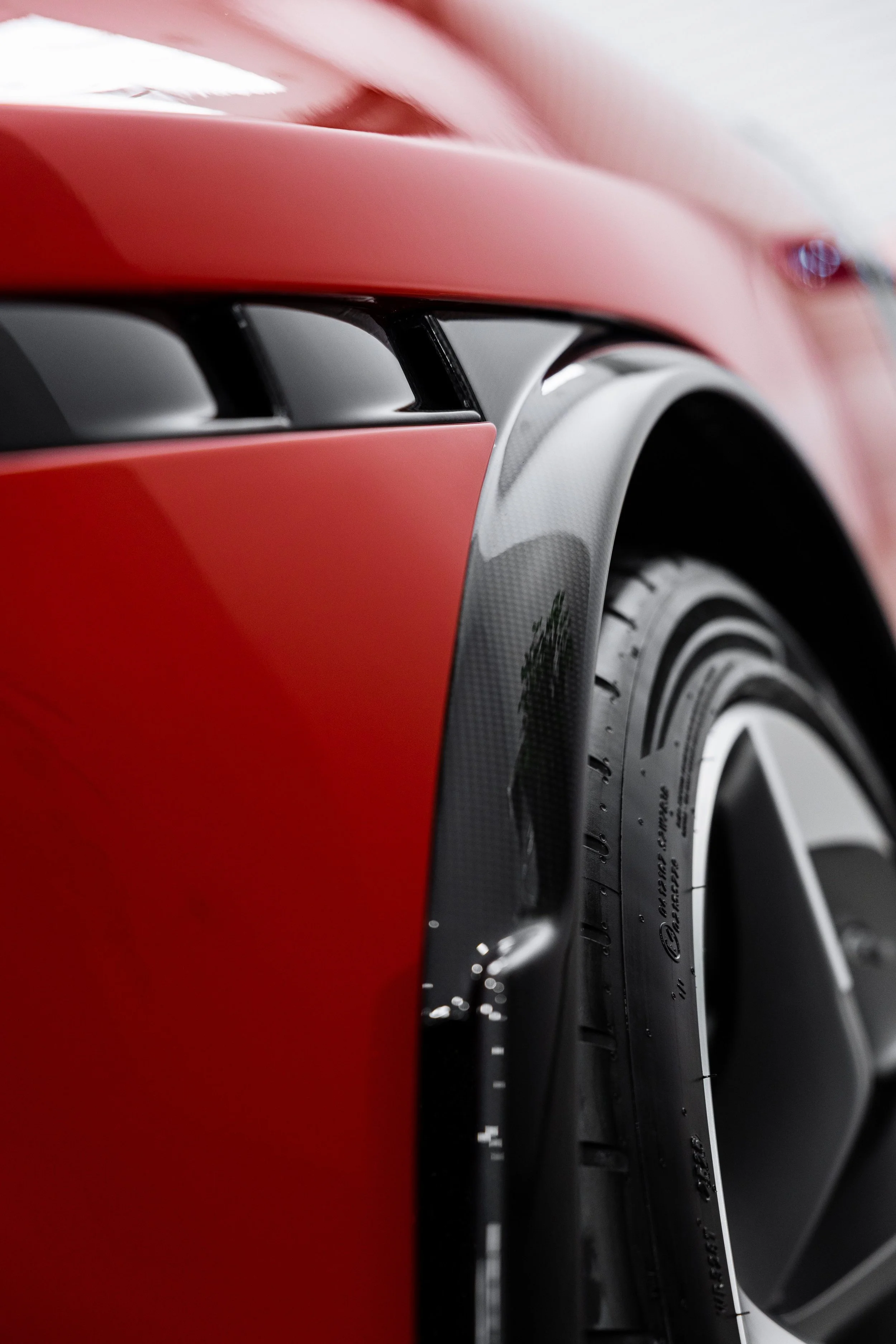 Red Ferrari 849 Testarossa front wheel arch with XPEL Paint Protection Film in Sydney