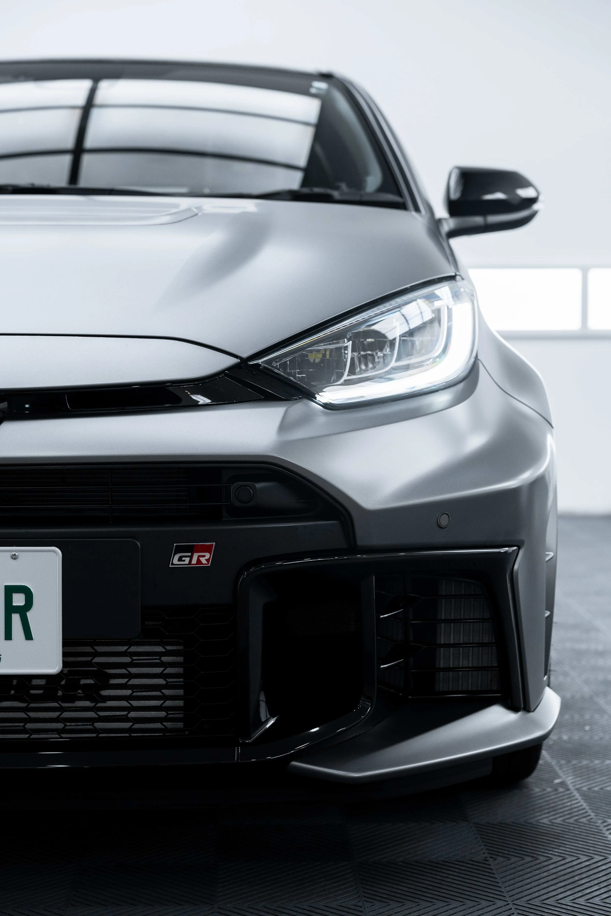 Matte grey Toyota GR Yaris front bumper and GR badge with XPEL Paint Protection Film in Sydney