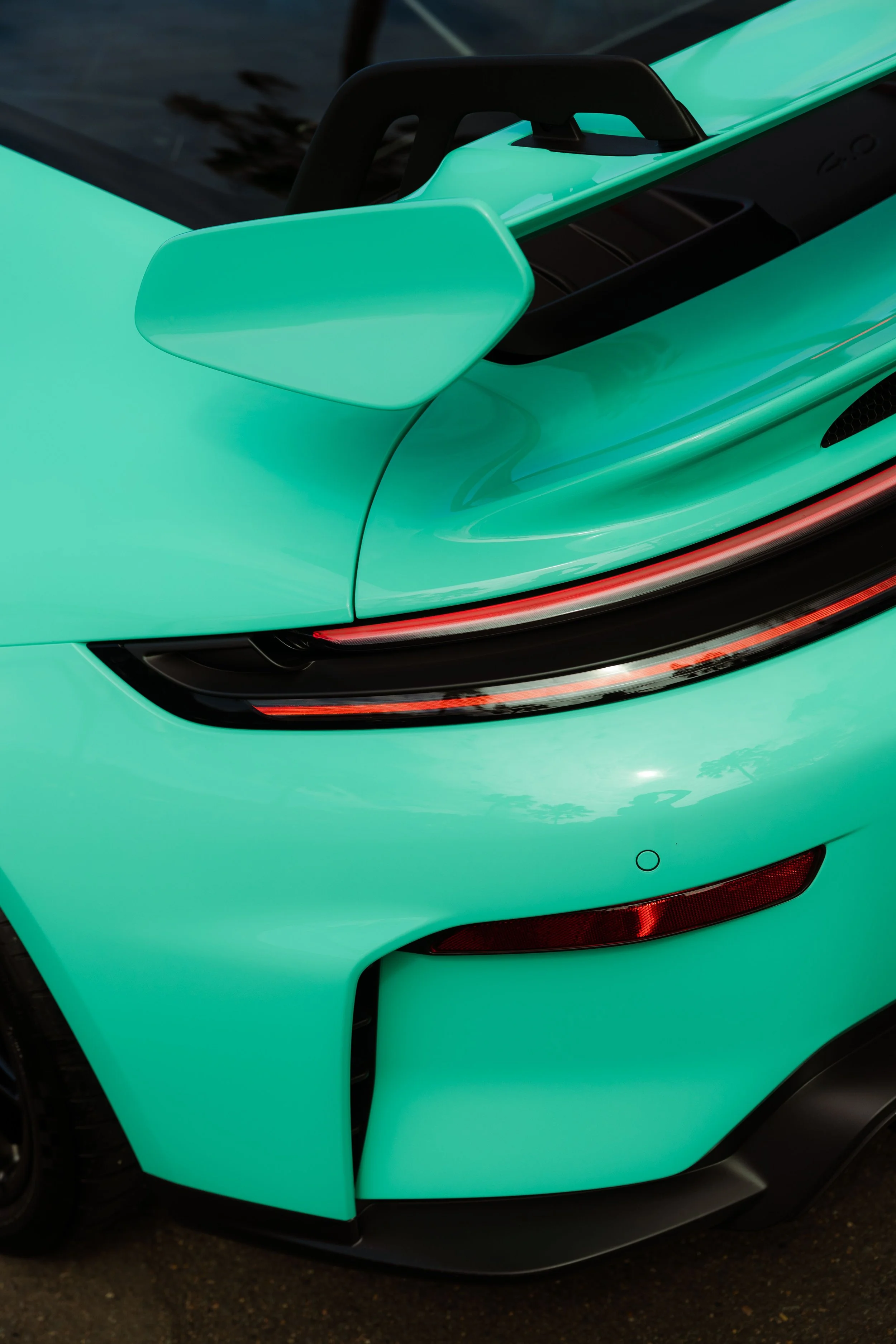 Mint green Porsche 911 GT3 rear wing, taillight and rear bumper with XPEL Paint Protection Film in Sydney
