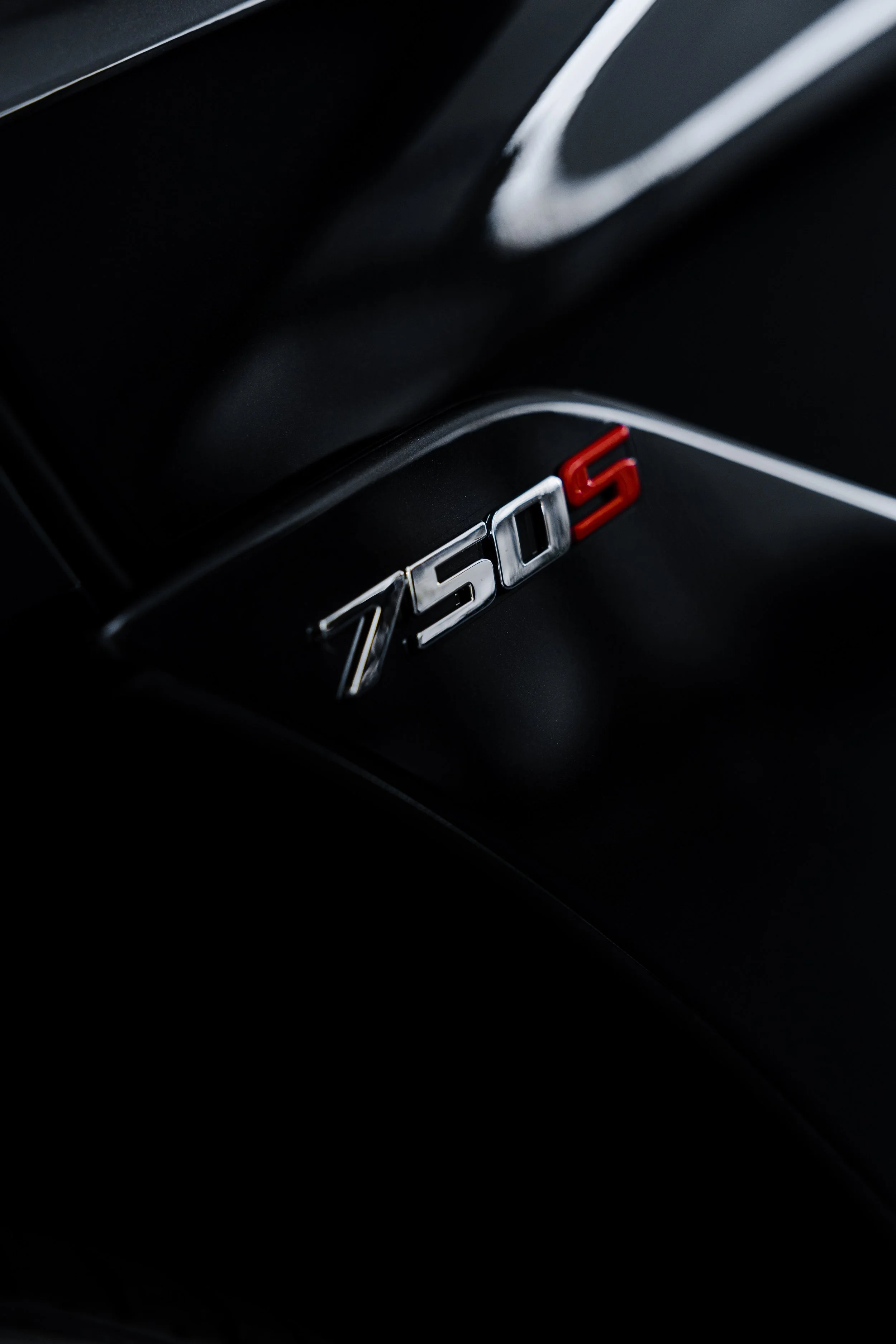 Black McLaren 750S 750S badge detail with XPEL Paint Protection Film in Mona Vale