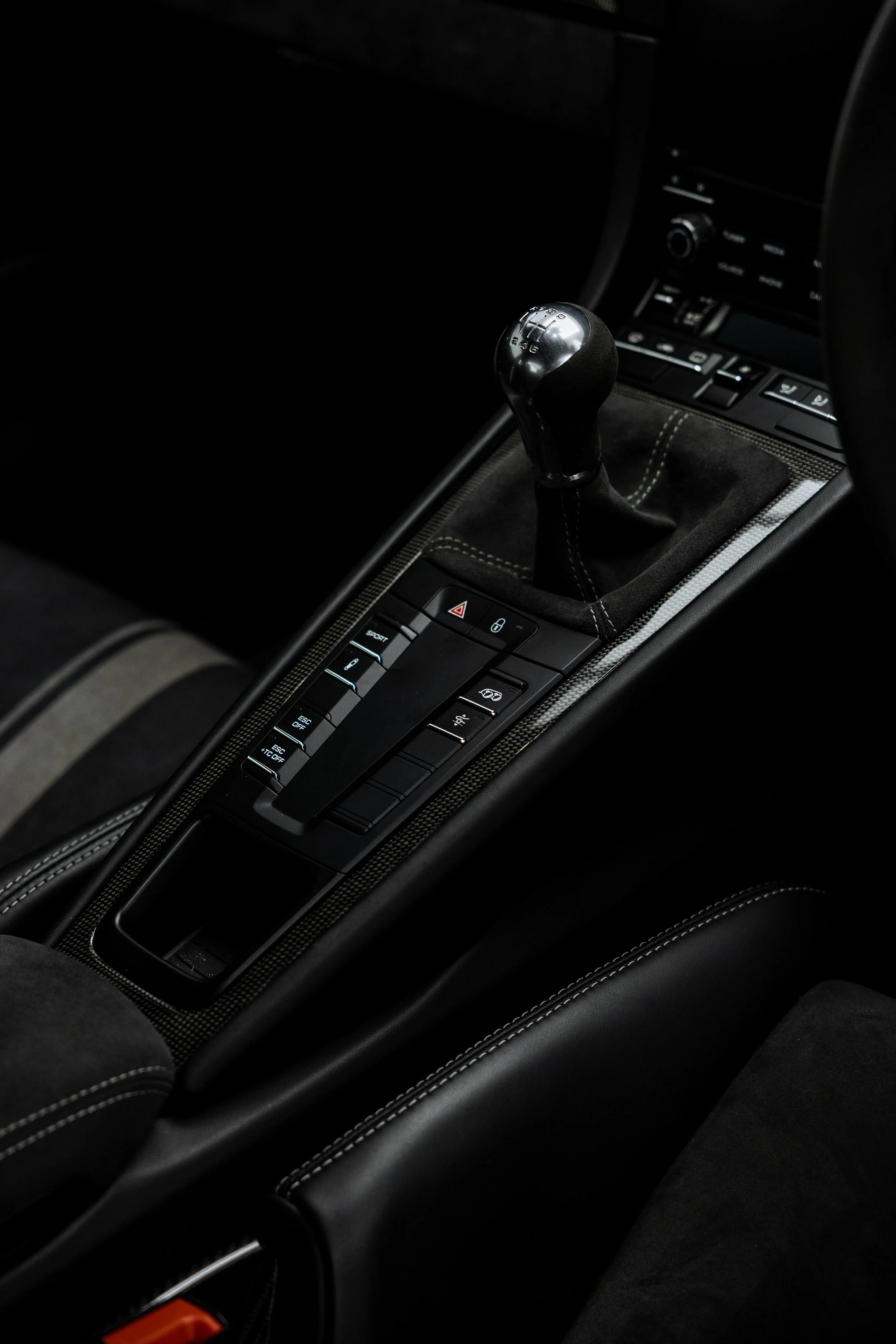 White Porsche GT3 interior detailing gear shifter and centre console in Mona Vale