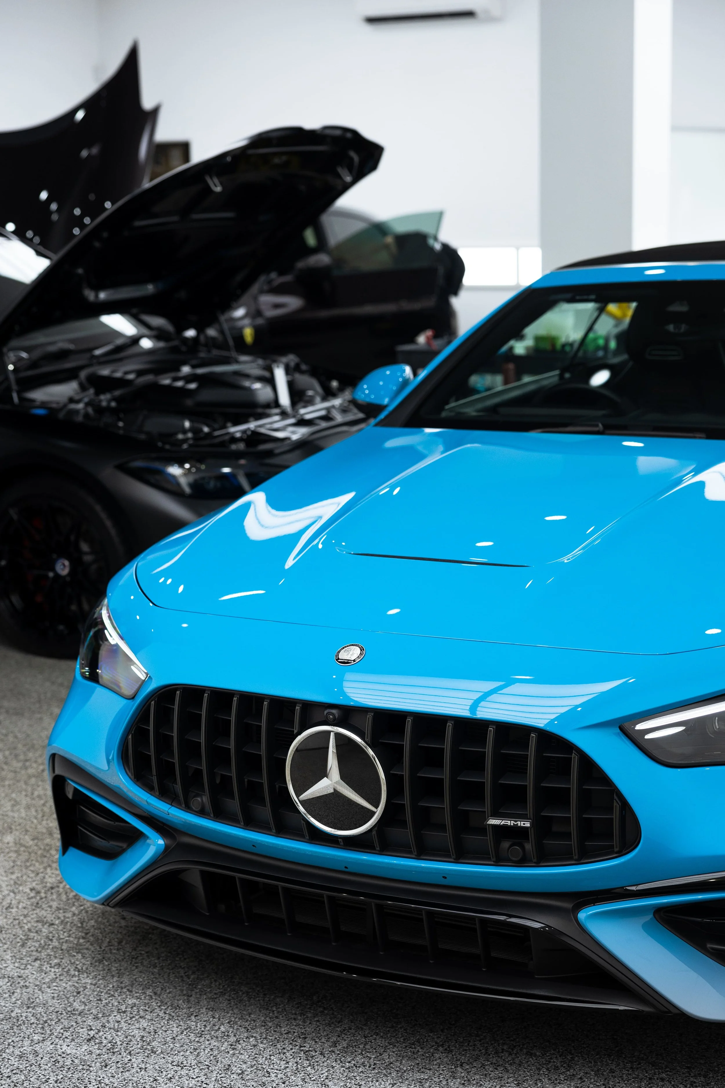 Front view of blue Mercedes-AMG with custom colour change wrap and paint protection film by ADS in Mona Vale