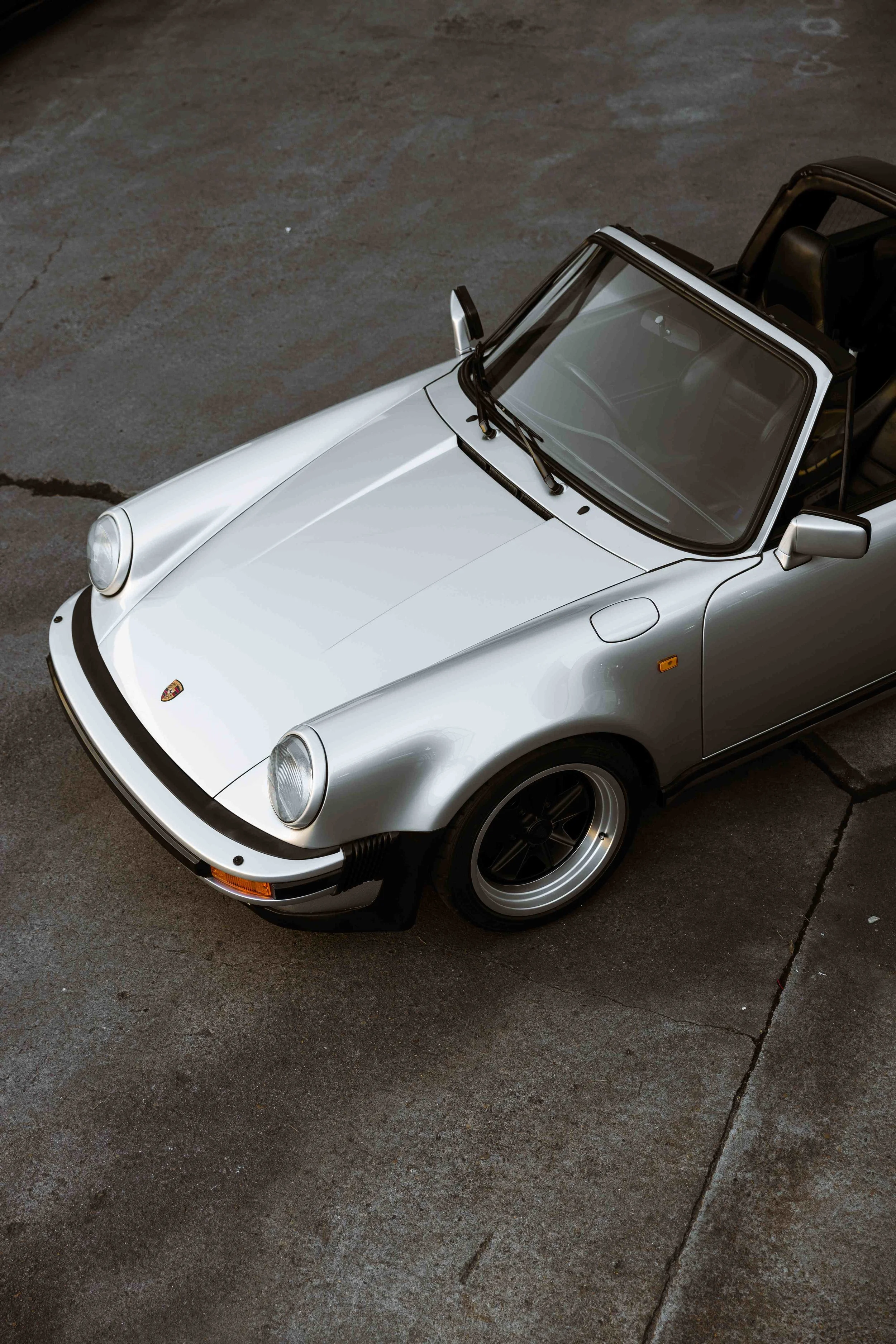 Silver 1989 Porsche 911 Carrera Targa front three quarter roof off with front end XPEL Paint Protection Film in Mona Vale