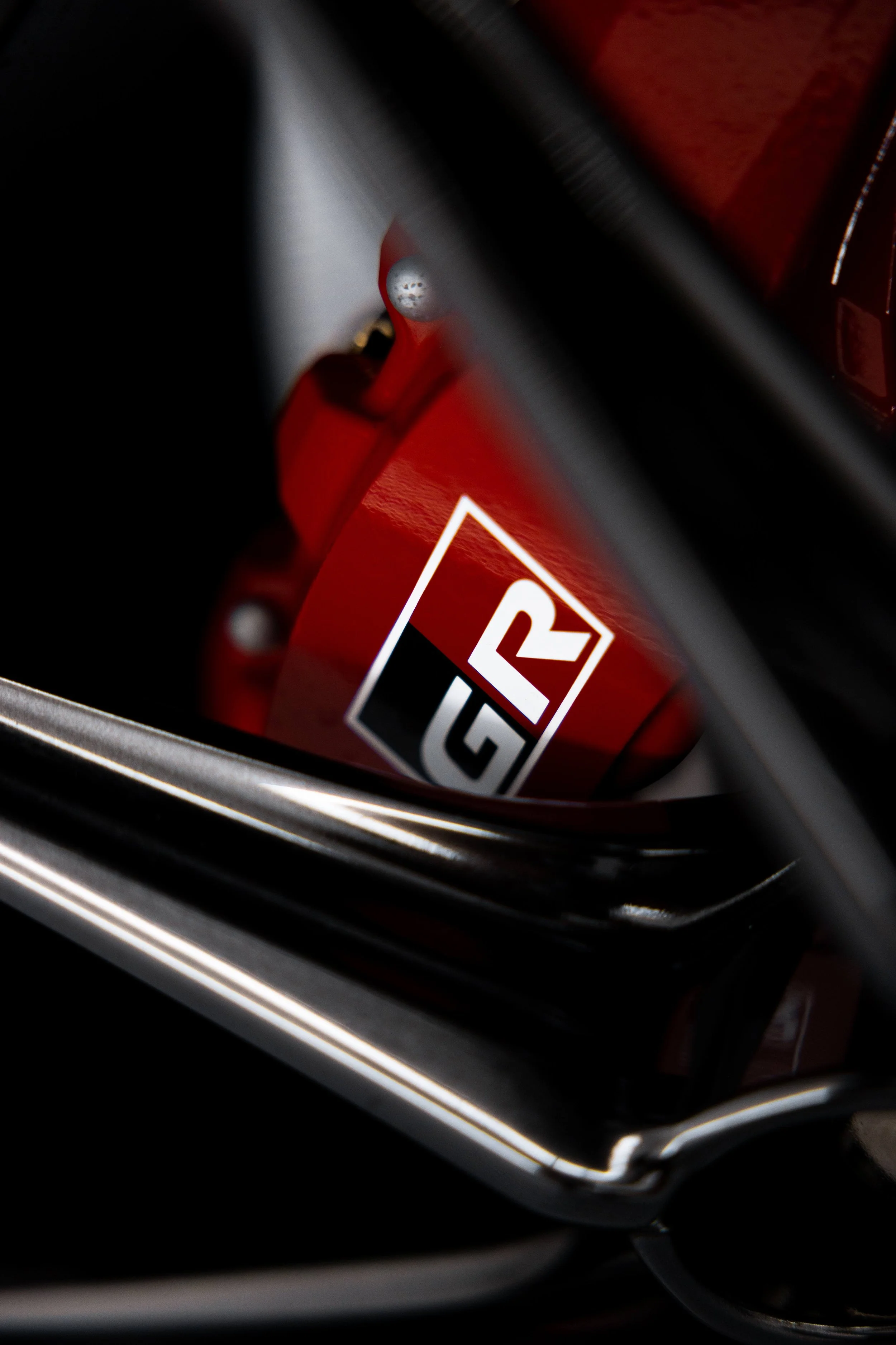 Matte grey Toyota GR Yaris red brake caliper with GR badge in Sydney