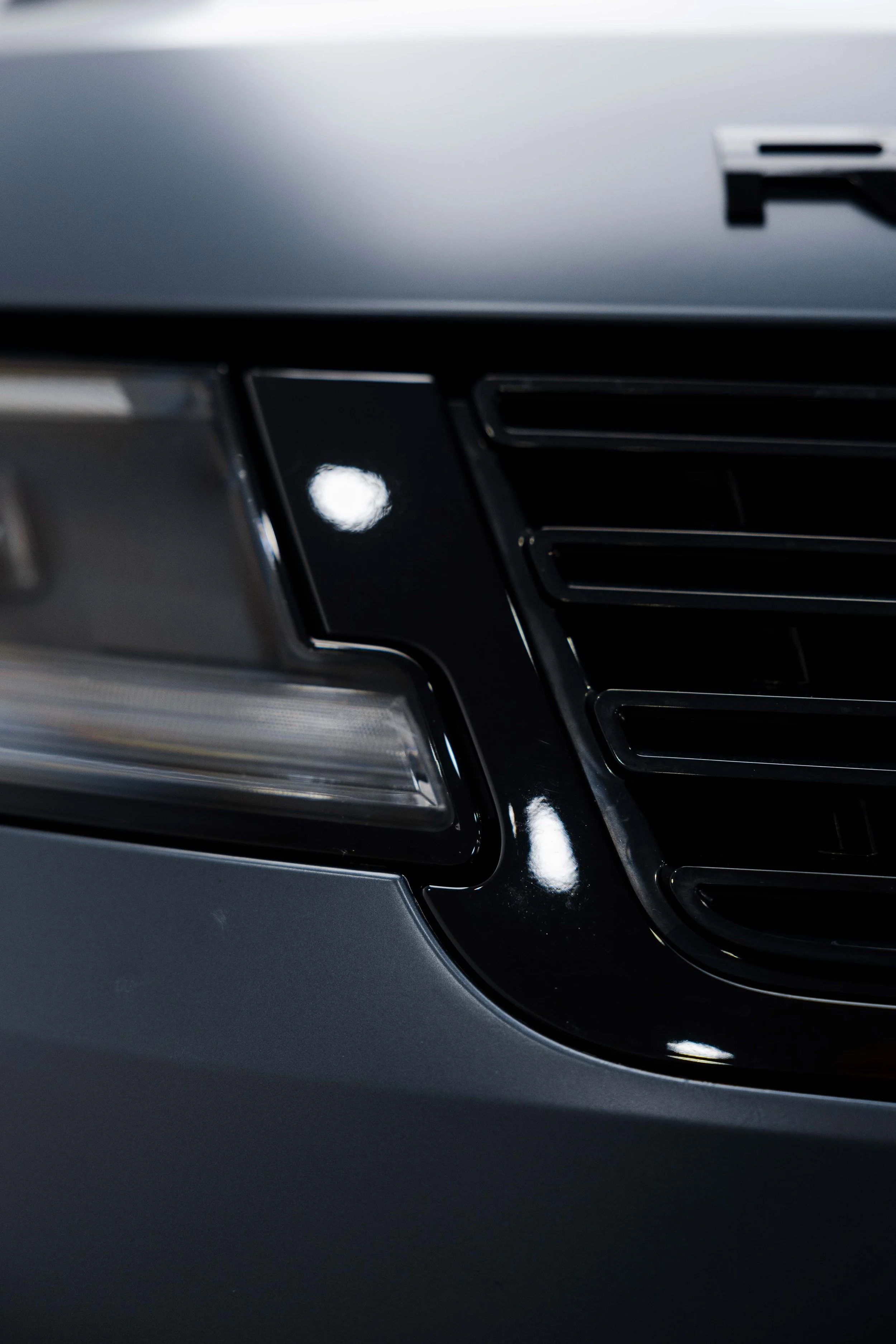 Range Rover Sport headlight and grille with XPEL Stealth Paint Protection Film in Sydney