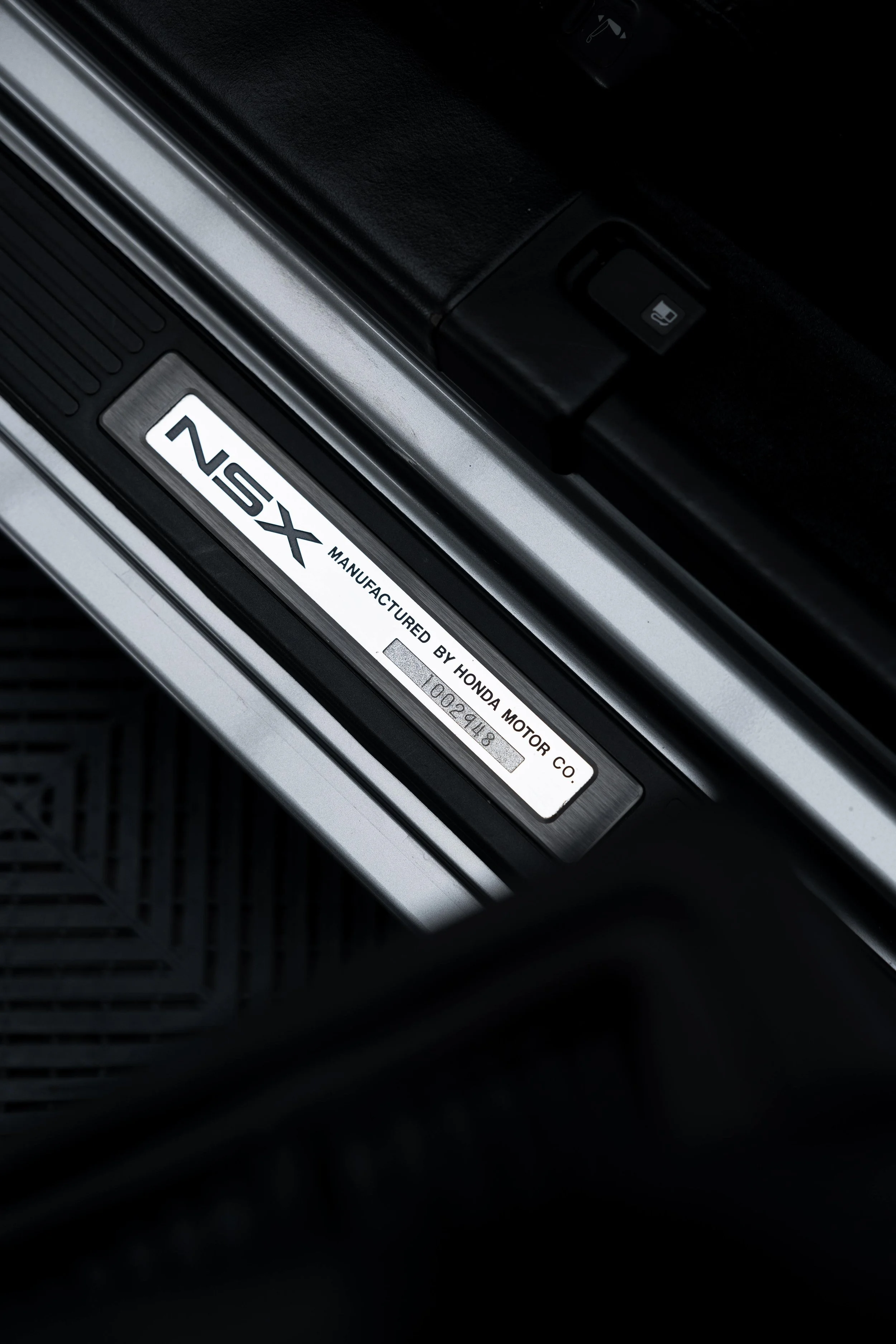 Honda NSX manufacturer plate on door sill after interior detailing in Sydney