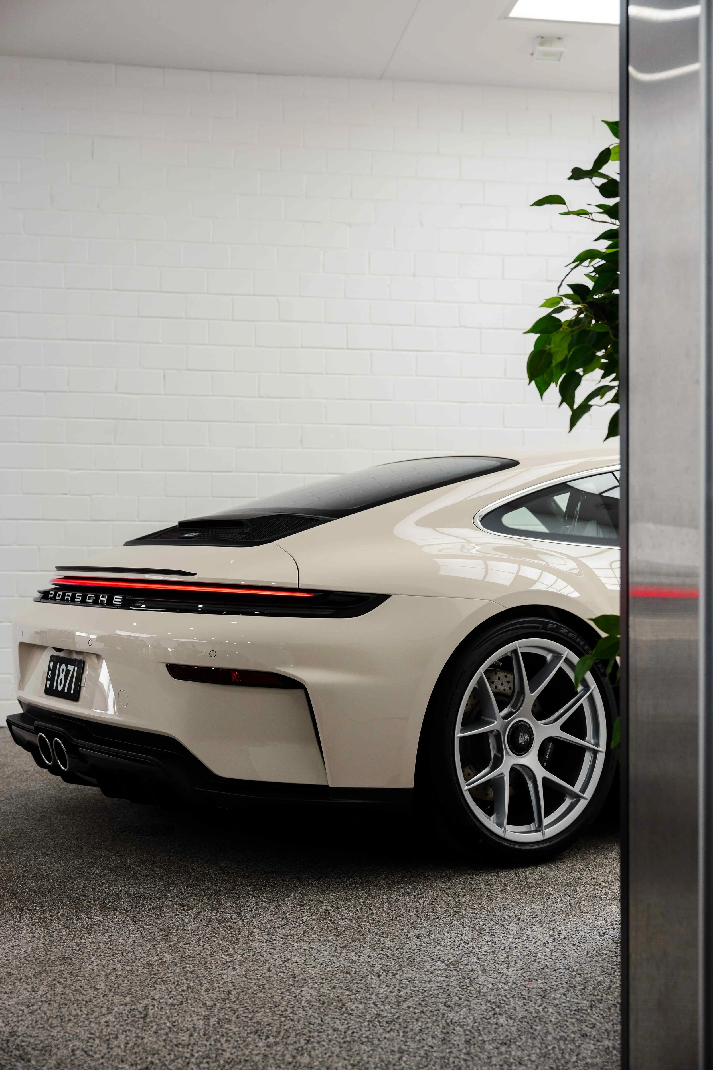 Cream Porsche 911 GT3 Touring rear three quarter outside studio with XPEL Paint Protection Film in Sydney