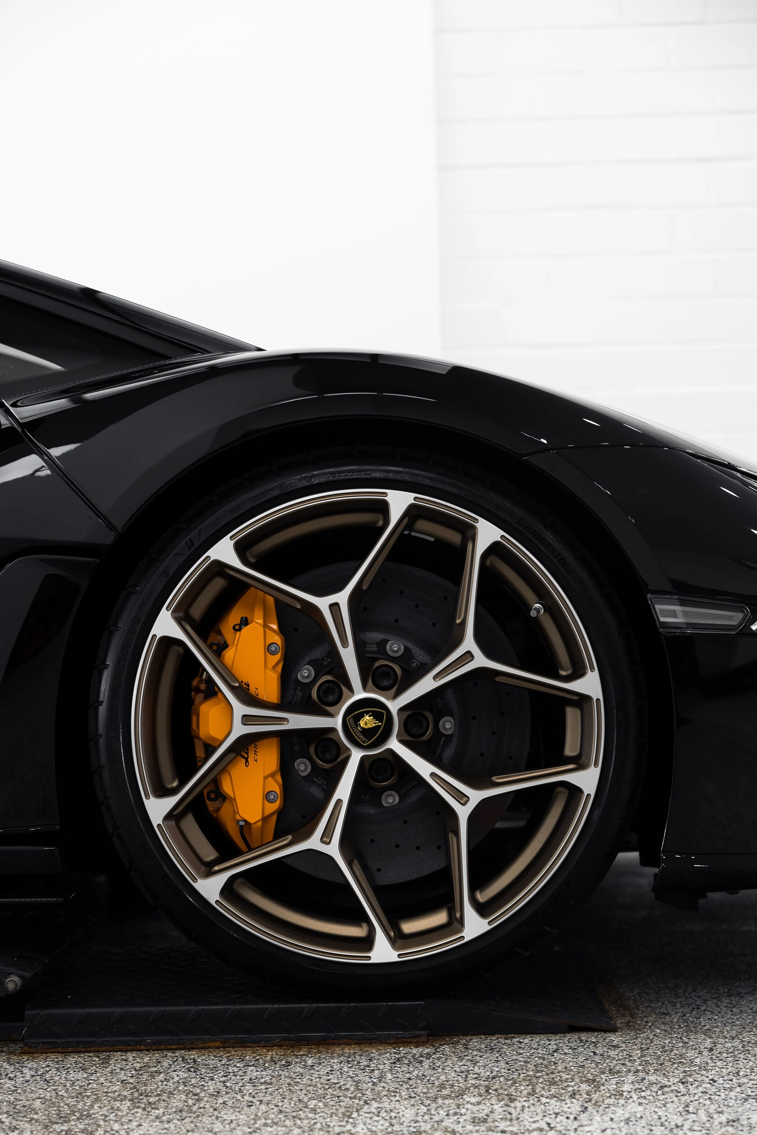 Black Lamborghini Revuelto wheel detail with PPF protection by ADS in Sydney