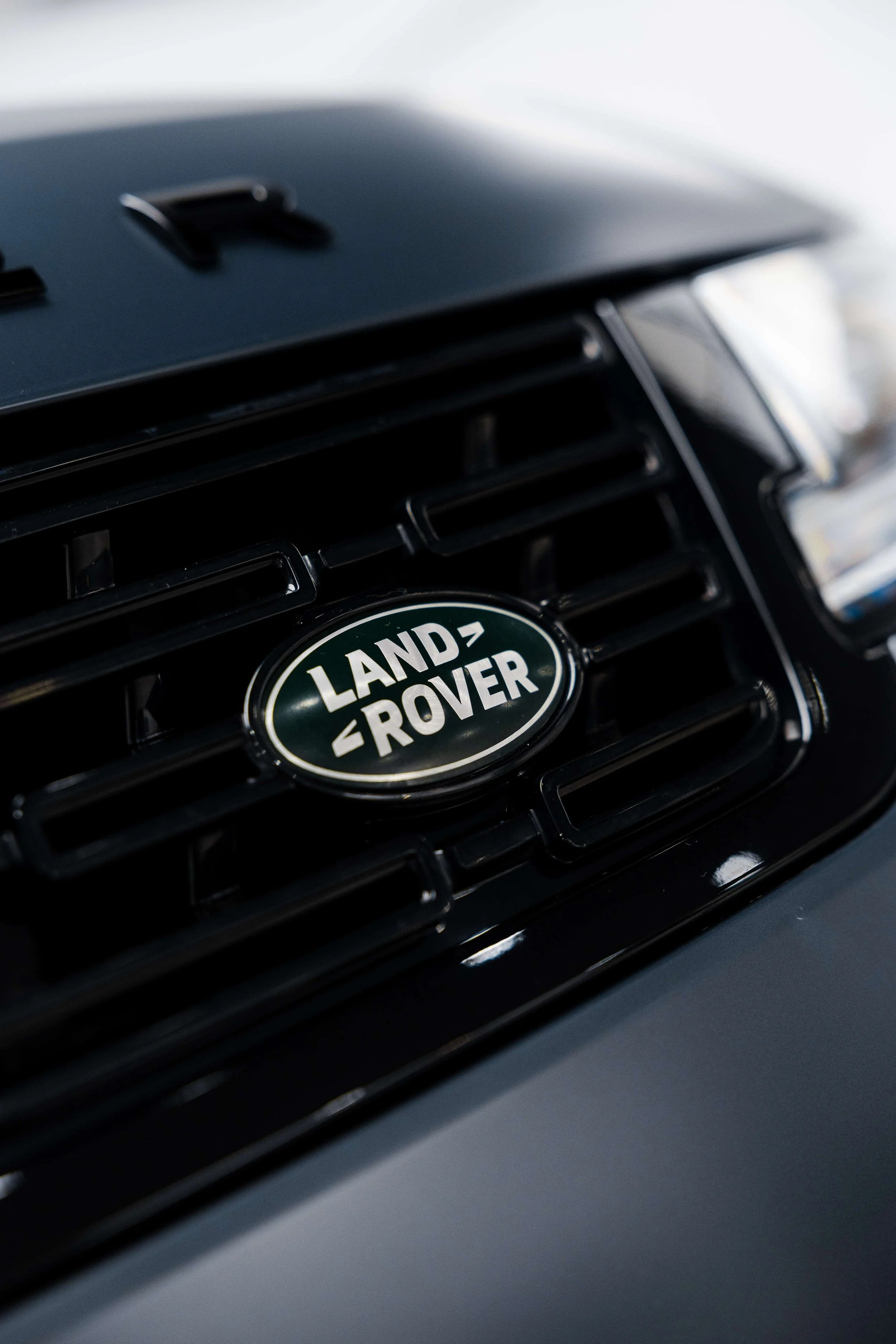 Land Rover badge on grille with XPEL Stealth Paint Protection Film in Mona Vale