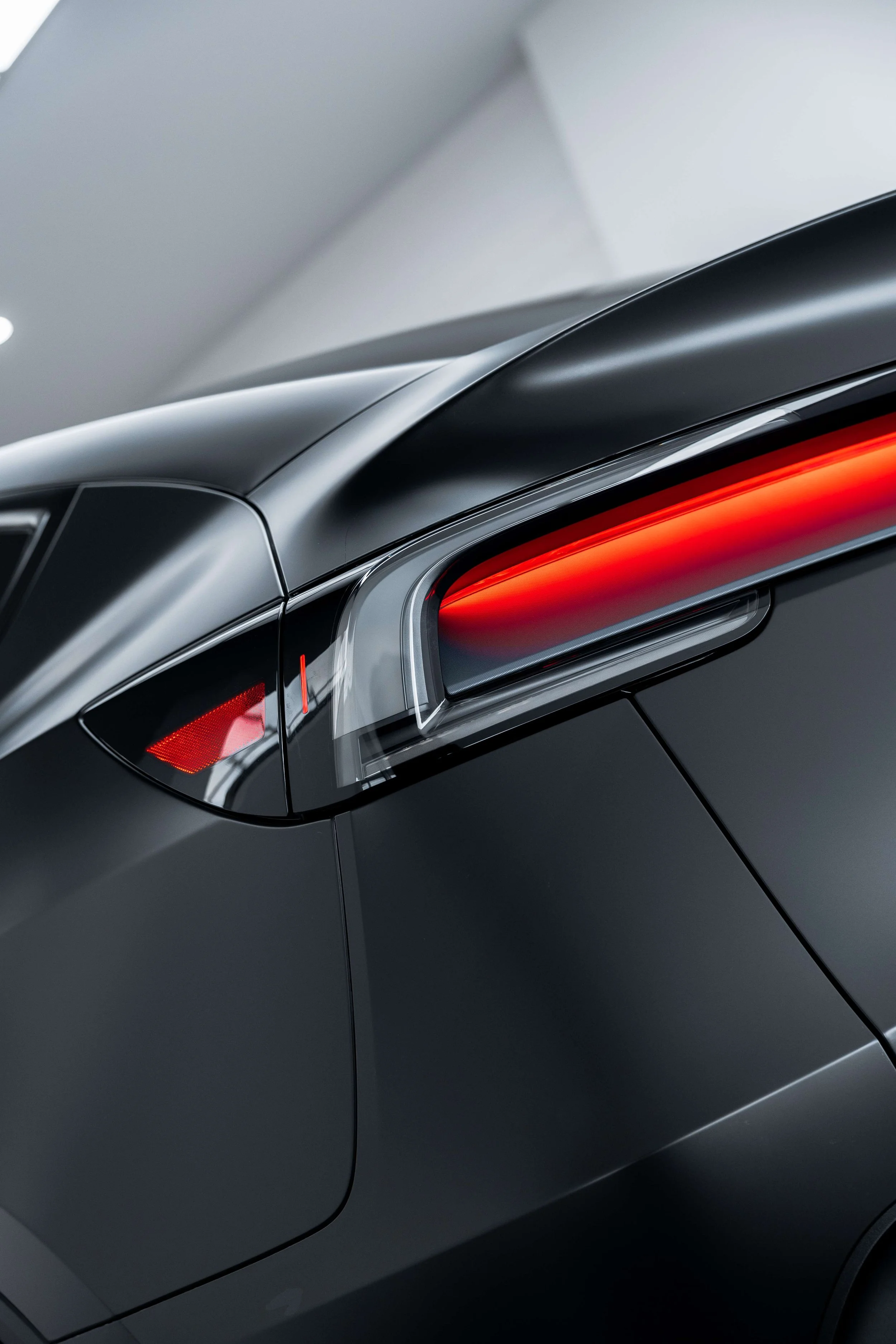 Matte black Tesla Model Y tail light with XPEL Stealth Paint Protection Film in Sydney