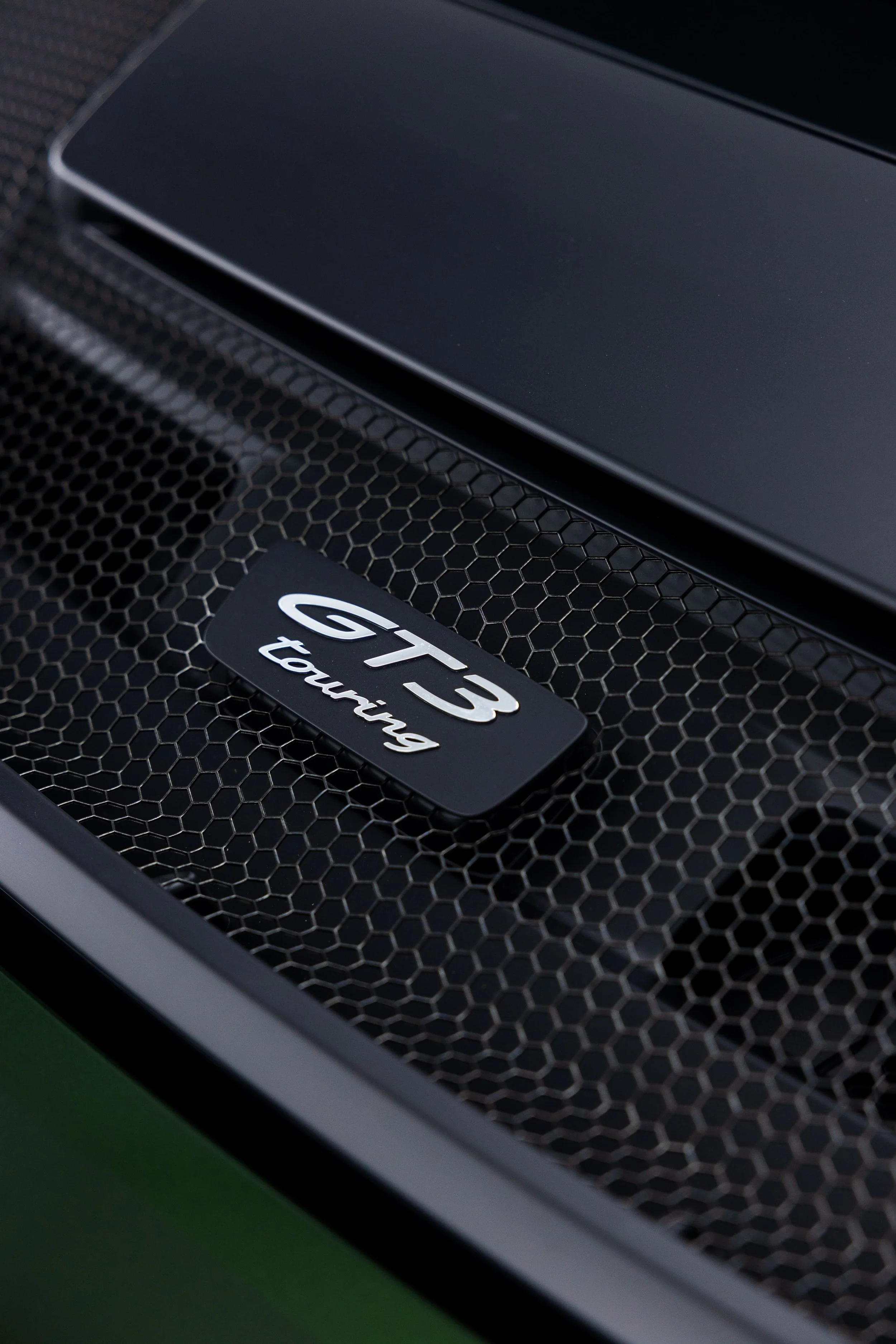 Porsche 911 GT3 Touring rear grille badge detail with full PPF by ADS in Mona Vale