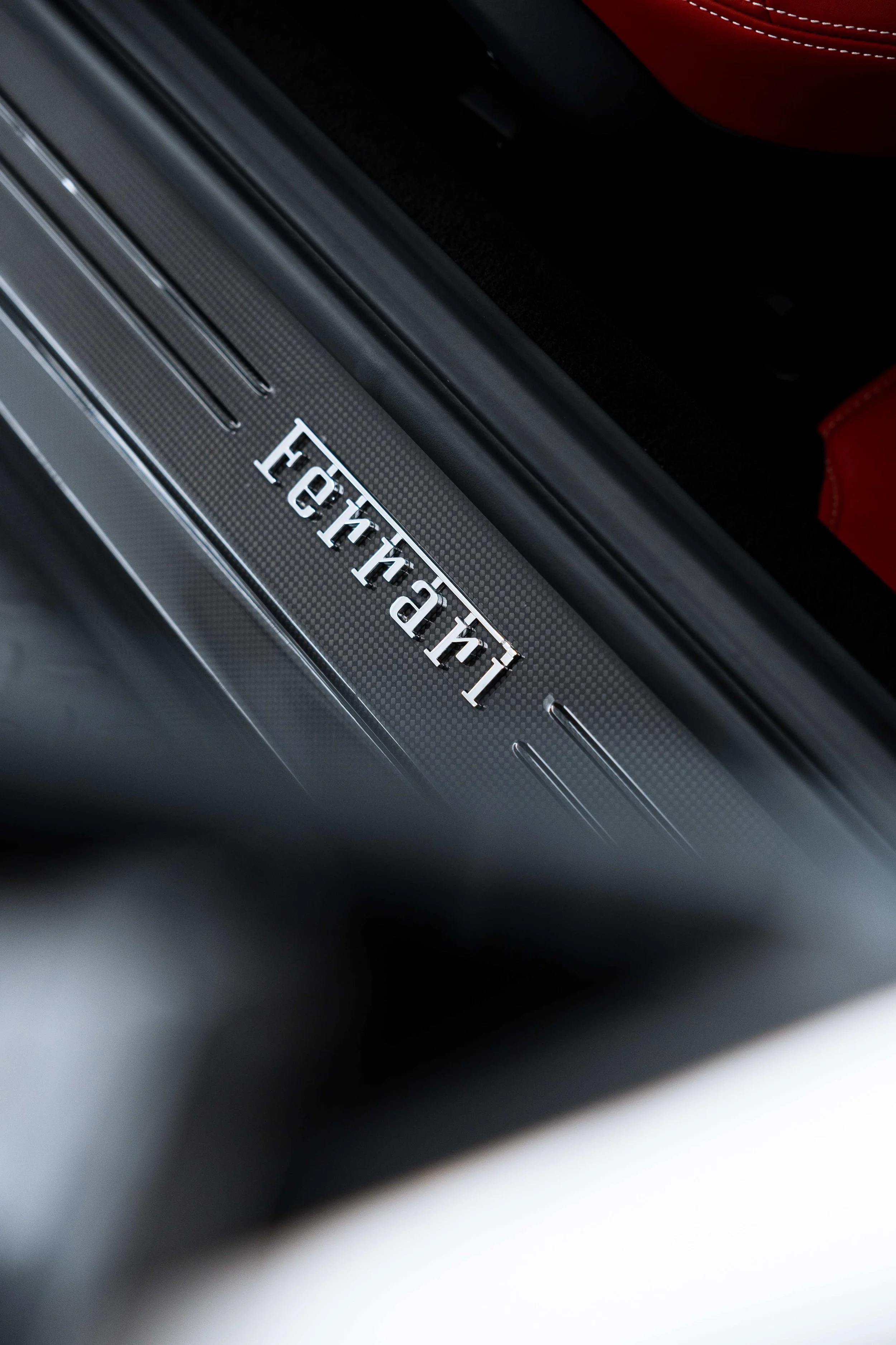 White Ferrari 812 GTS interior detailing door sill Ferrari plaque in Mona Vale