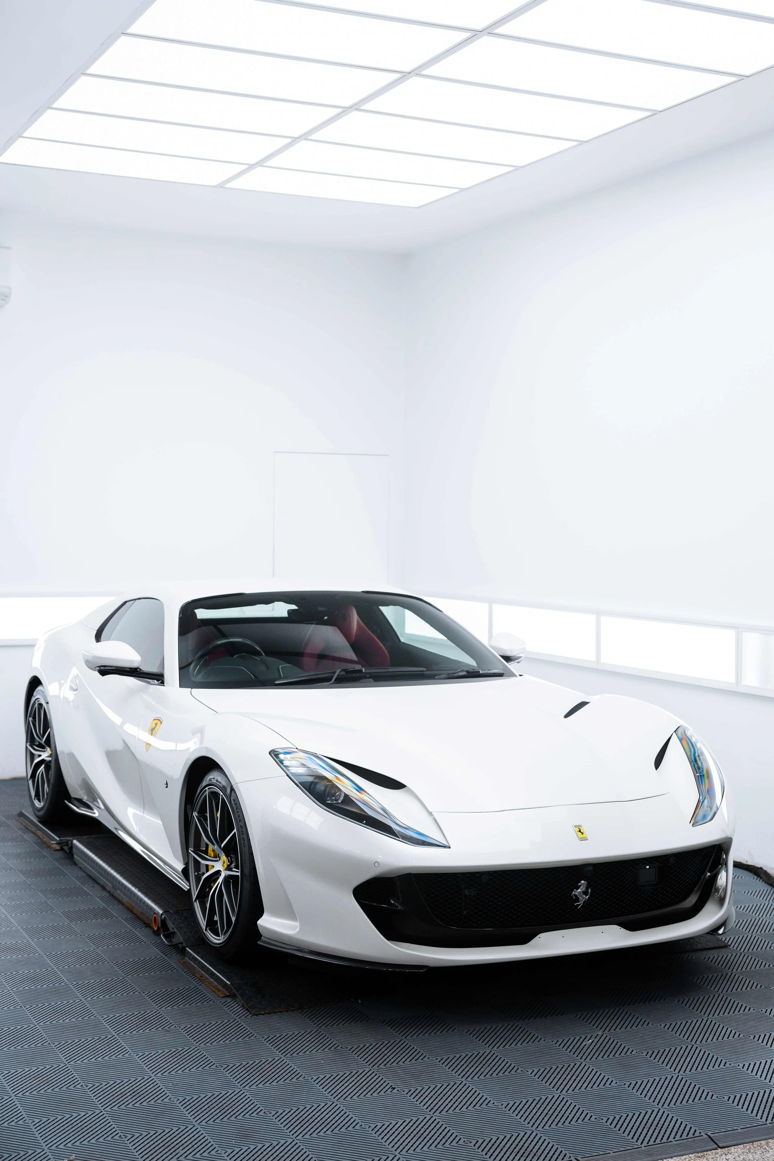 White Ferrari 812 GTS front three quarter with XPEL Paint Protection Film in Mona Vale