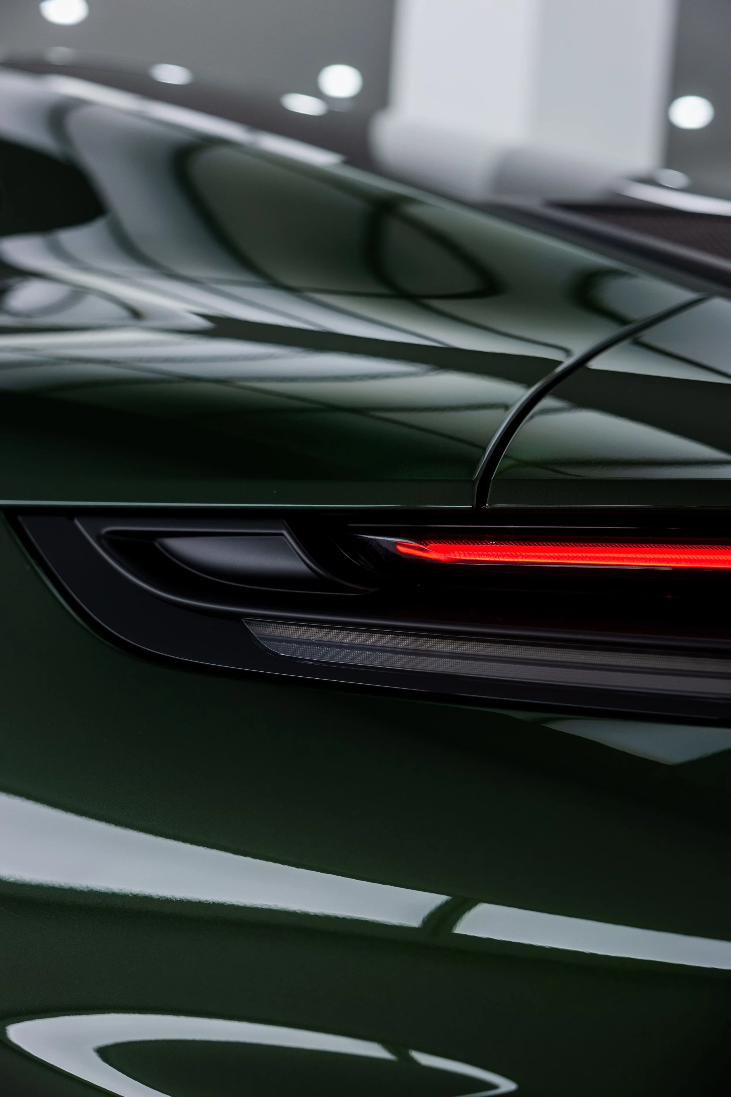 Green Porsche 911 GT3 Touring rear taillight detail with full PPF by ADS in Mona Vale