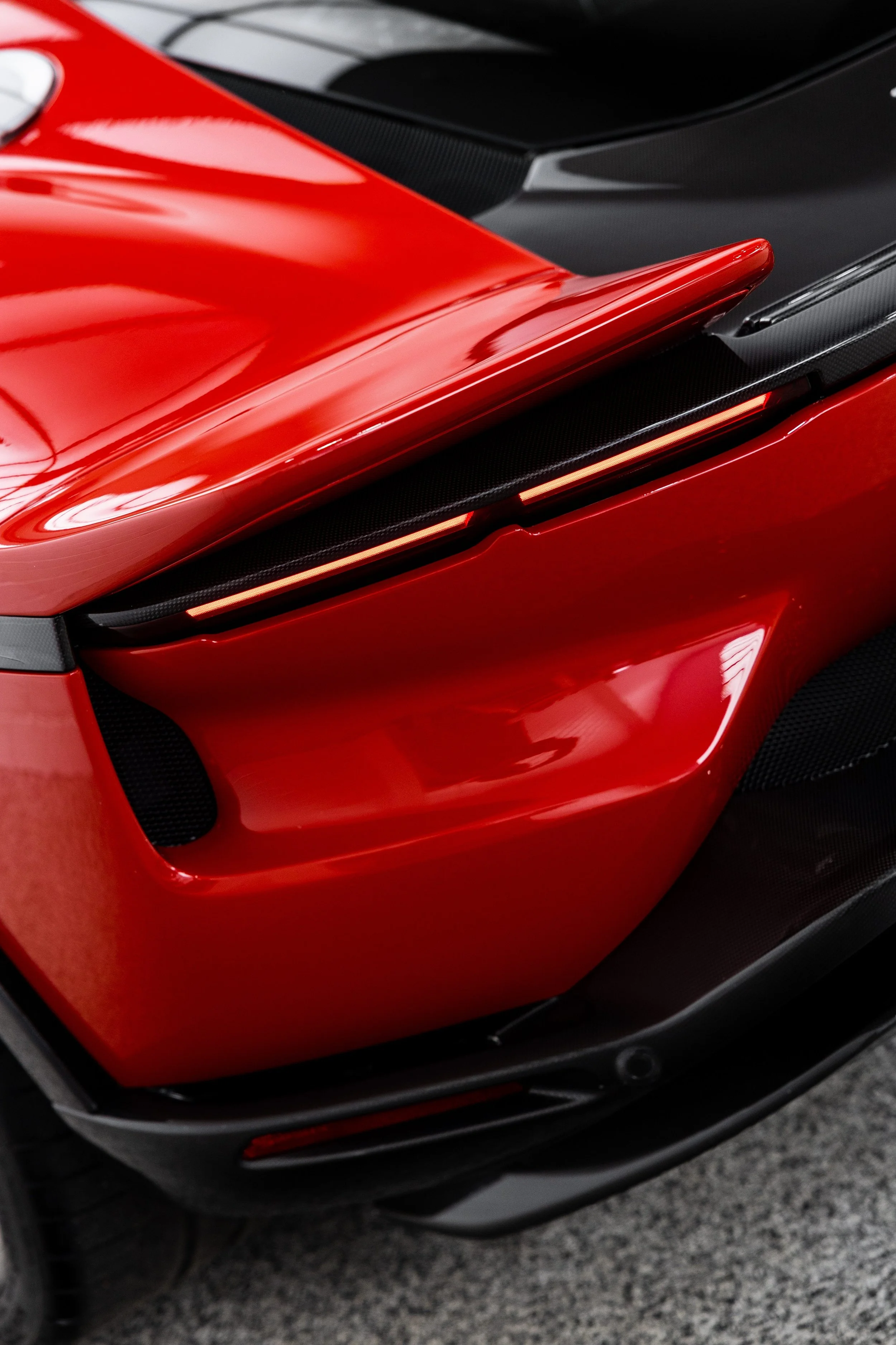 Red Ferrari 849 Testarossa rear spoiler and tail light with XPEL Paint Protection Film in Mona Vale