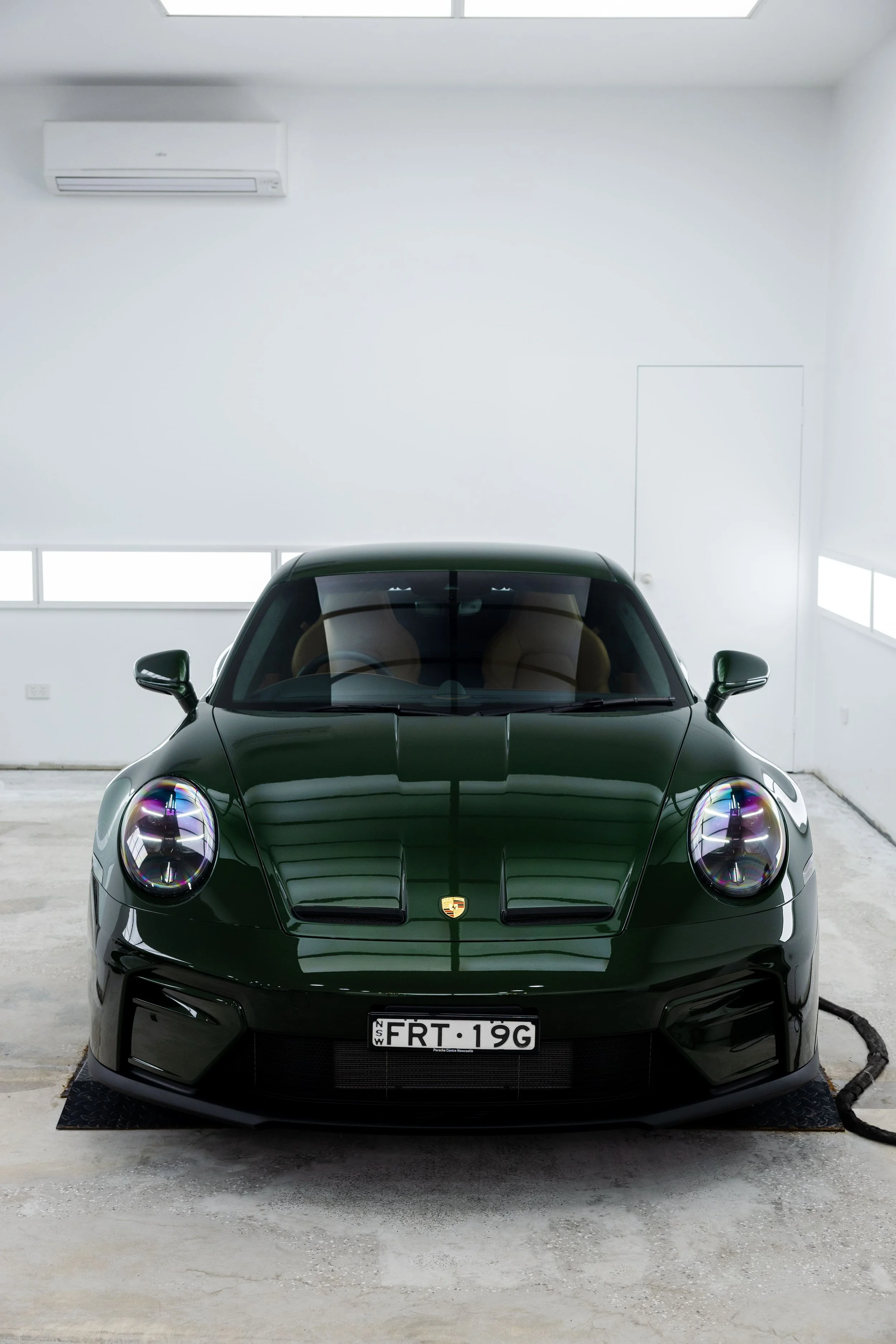 Green Porsche 911 GT3 Touring front view with full PPF by ADS in Mona Vale
