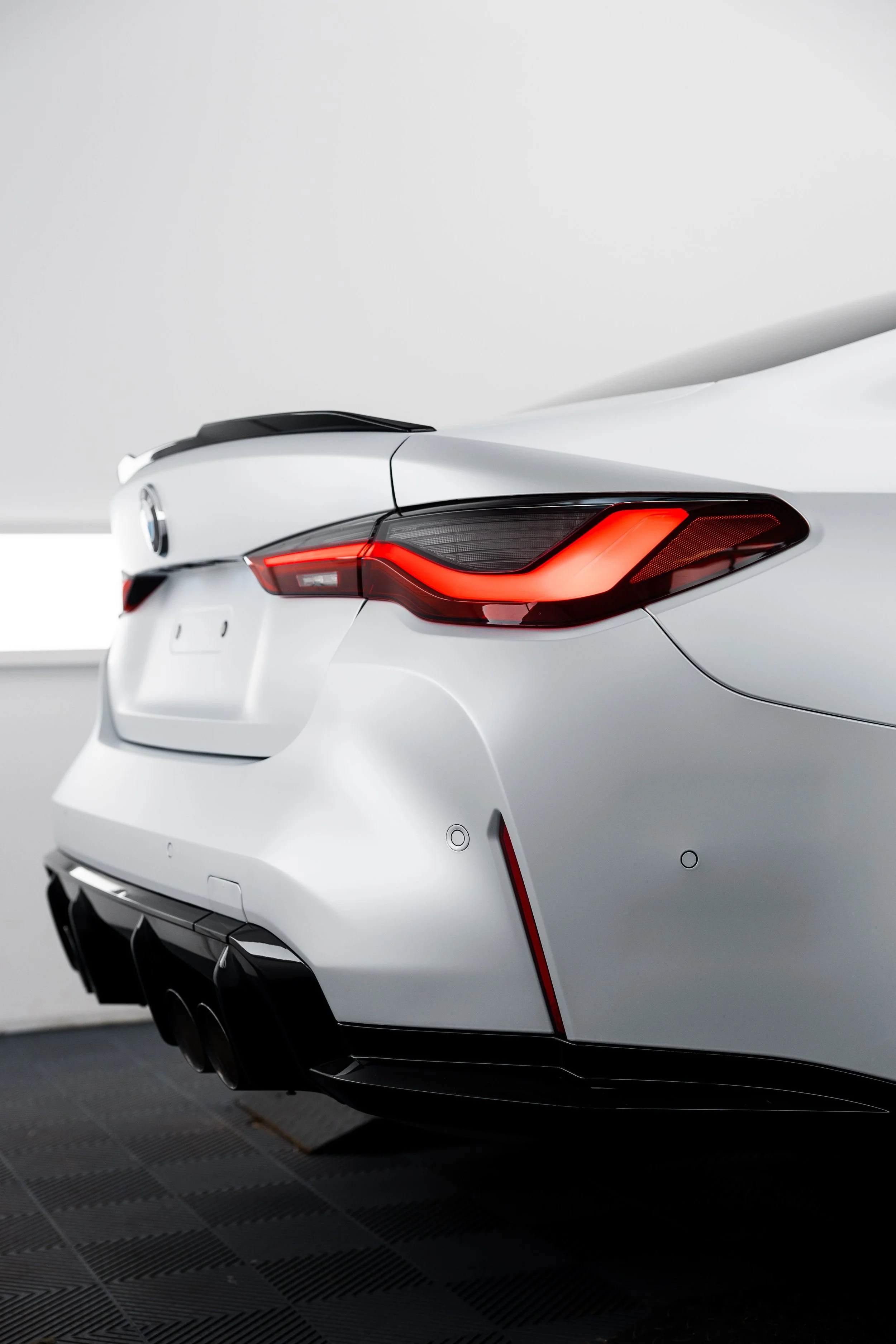 White BMW M4 Competition rear diffuser with XPEL Paint Protection Film in Mona Vale