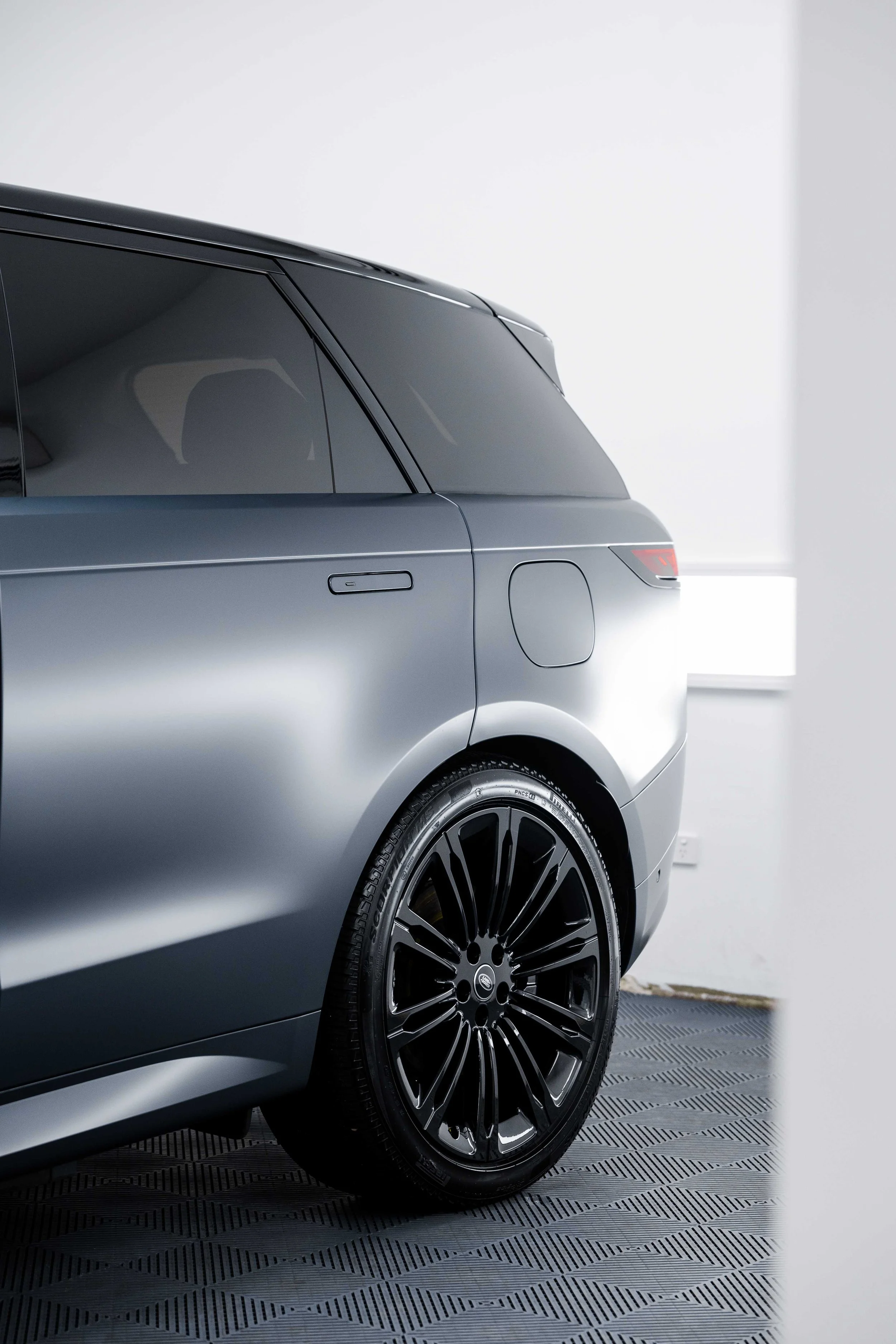 Matte grey Range Rover Sport rear quarter and wheel with XPEL Stealth Paint Protection Film in Mona Vale