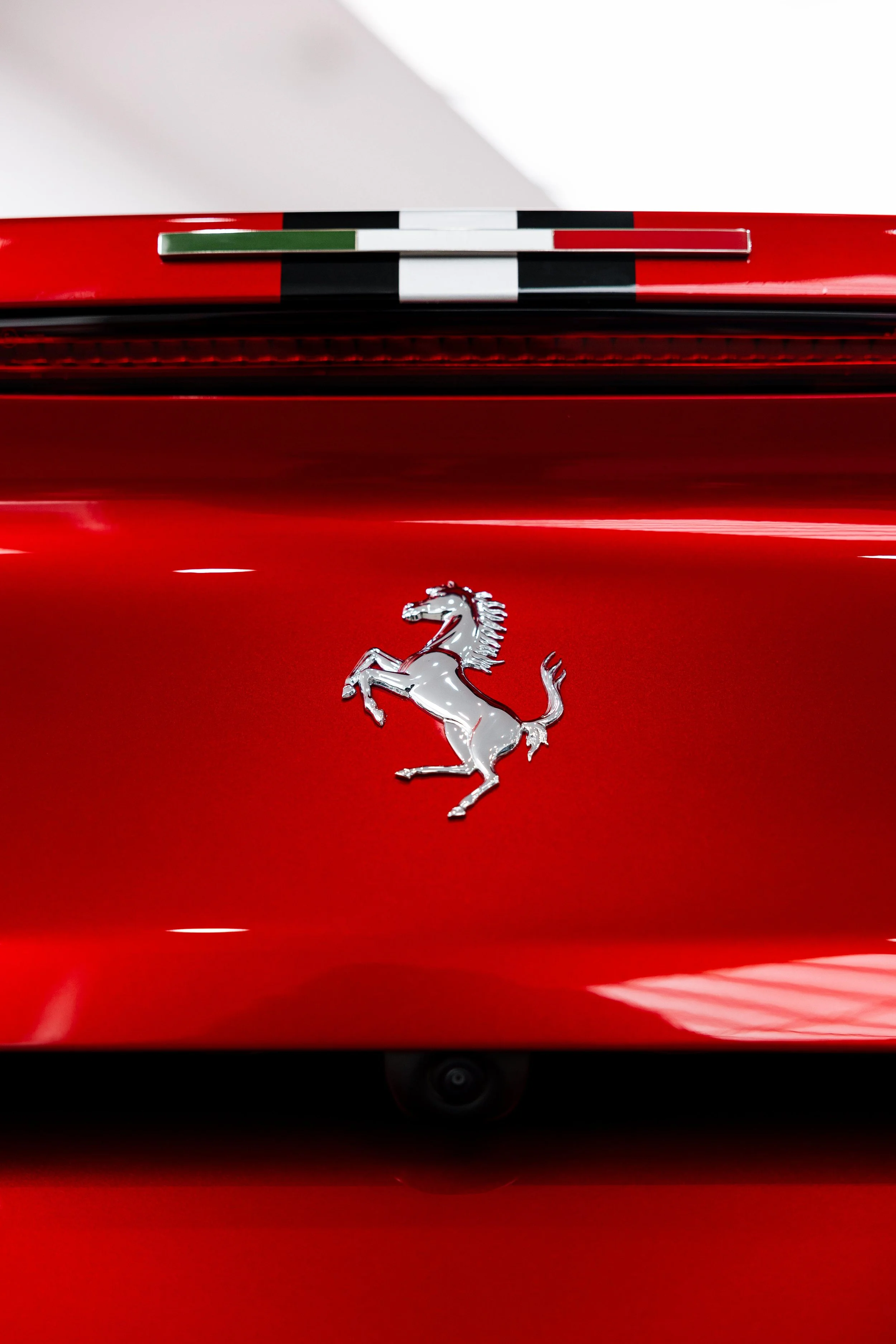 Red Ferrari 812 GTS Italian flag badge and Prancing Horse emblem with XPEL Paint Protection Film in Sydney