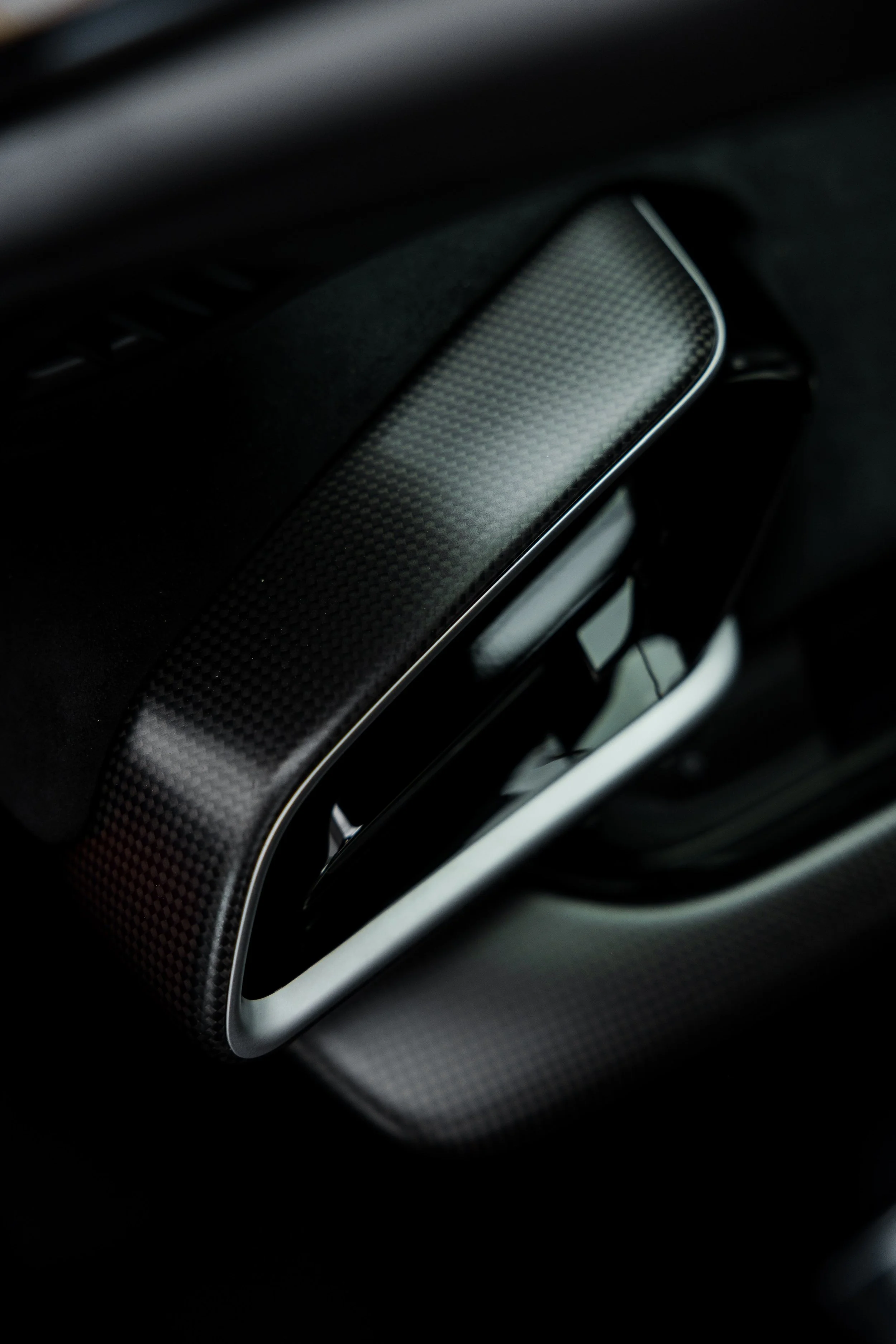 Red Ferrari 296 Speciale interior detailing carbon fibre door handle in Sydney