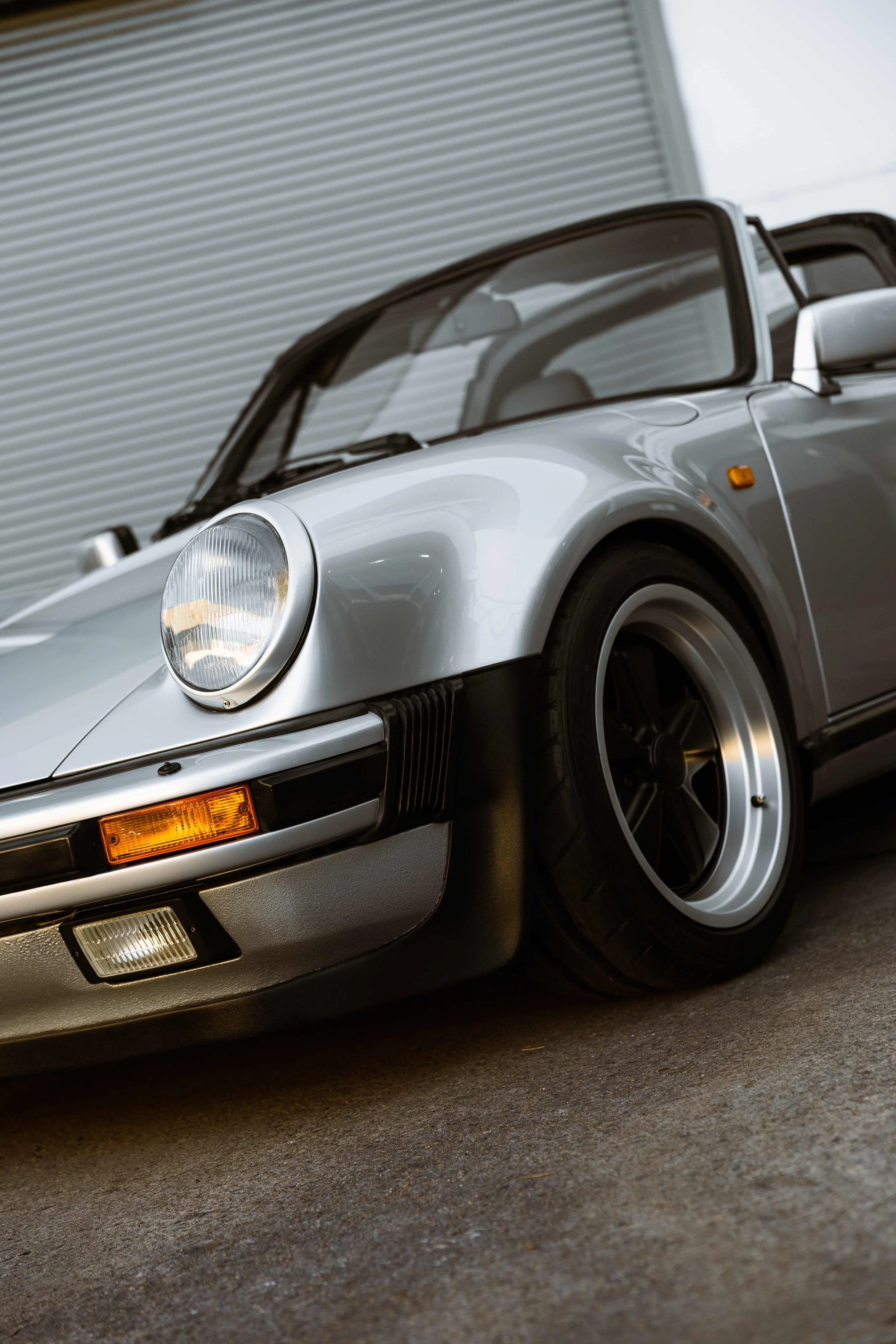 Silver 1989 Porsche 911 Carrera Targa front quarter and headlight with XPEL Paint Protection Film in Mona Vale