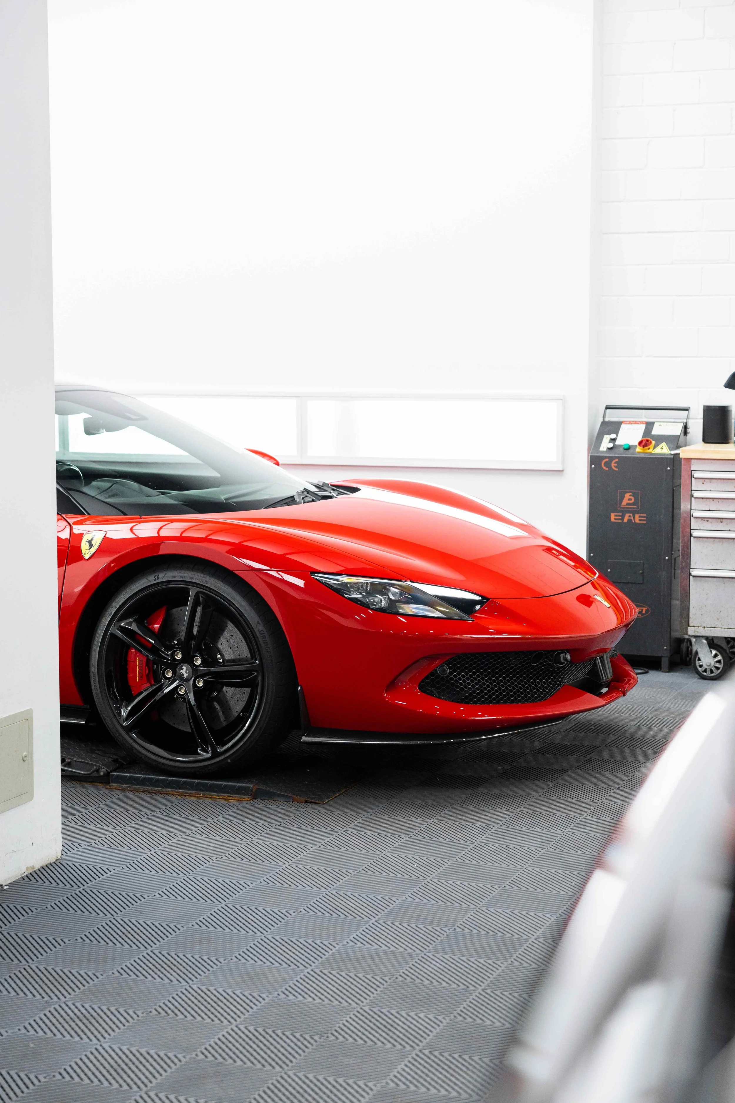 Red Ferrari 296 GTS front three quarter with XPEL Paint Protection Film in Sydney