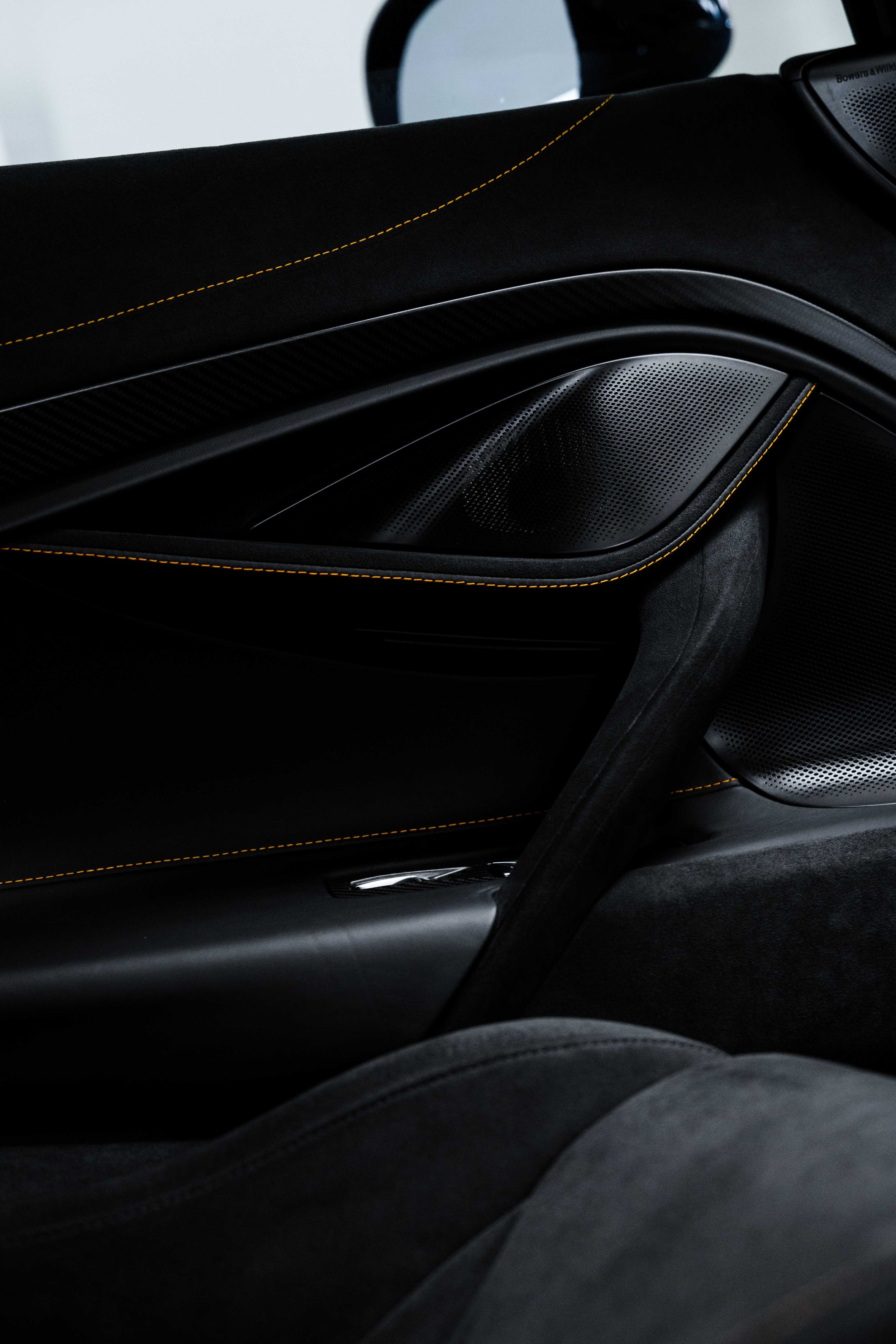Black McLaren 750S interior detailing door trim and seat stitching in Sydney