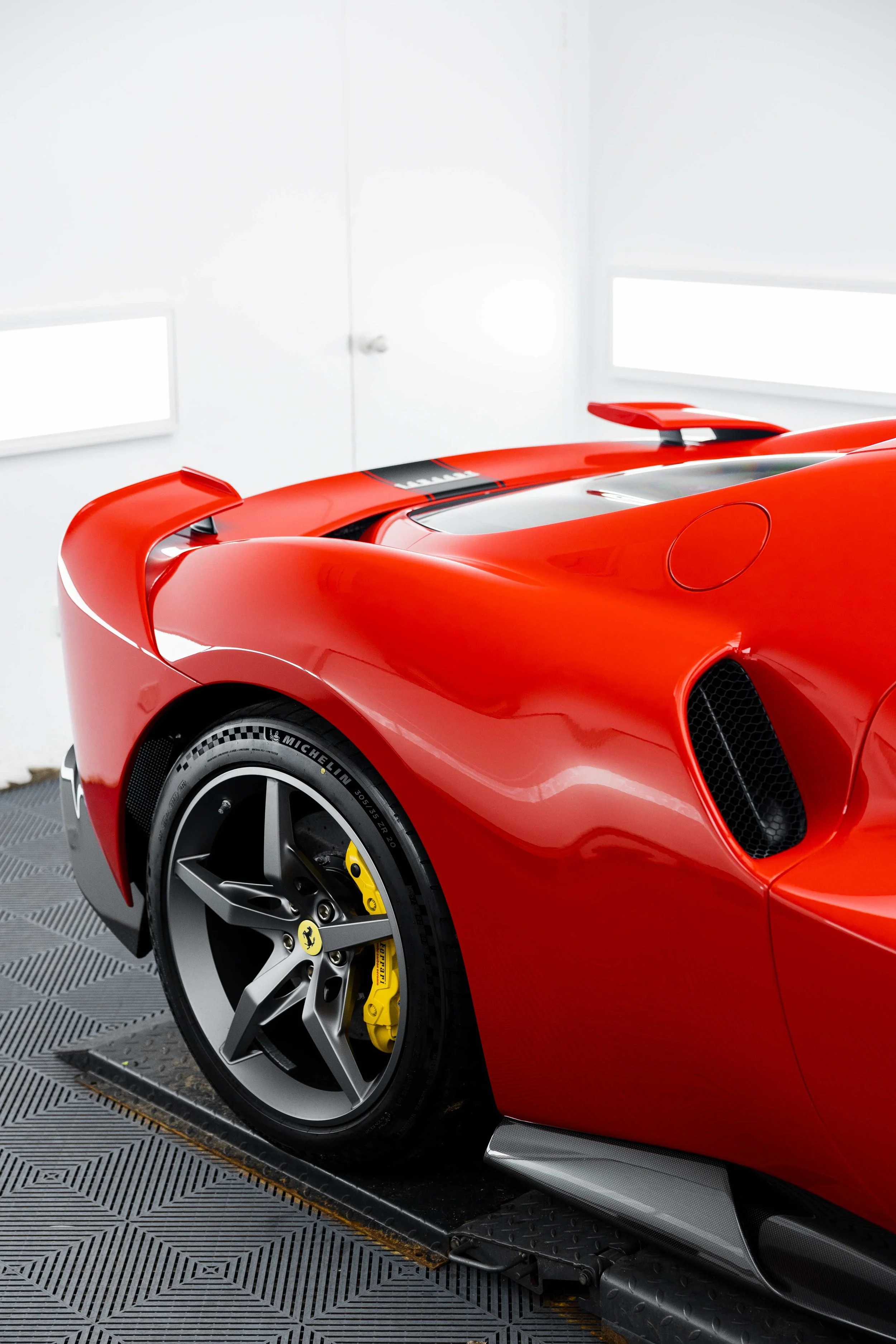 Red Ferrari 296 Speciale rear three quarter and wheel with XPEL Paint Protection Film in Mona Vale