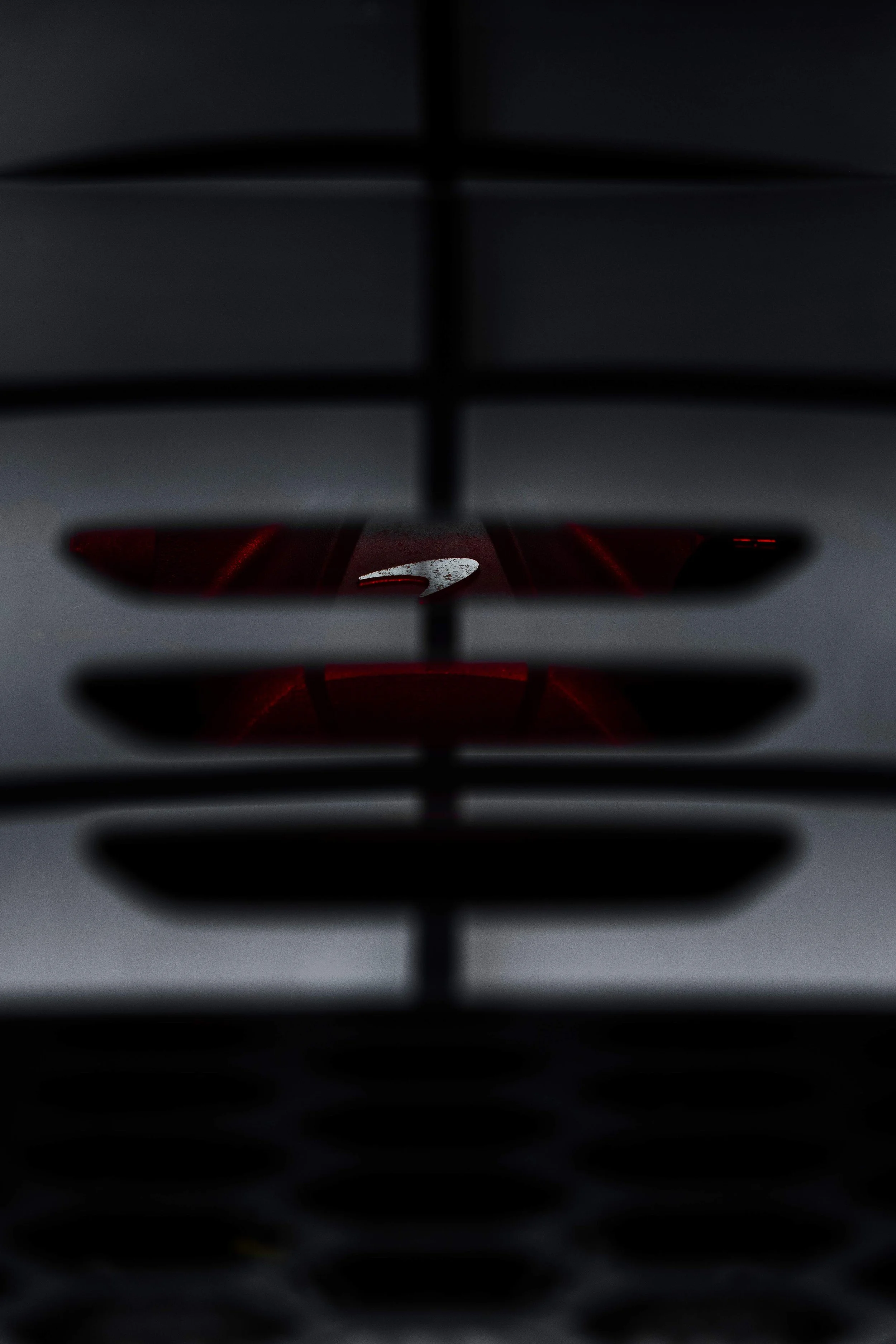 Black McLaren 750S rear taillight and McLaren badge with XPEL Paint Protection Film in Mona Vale