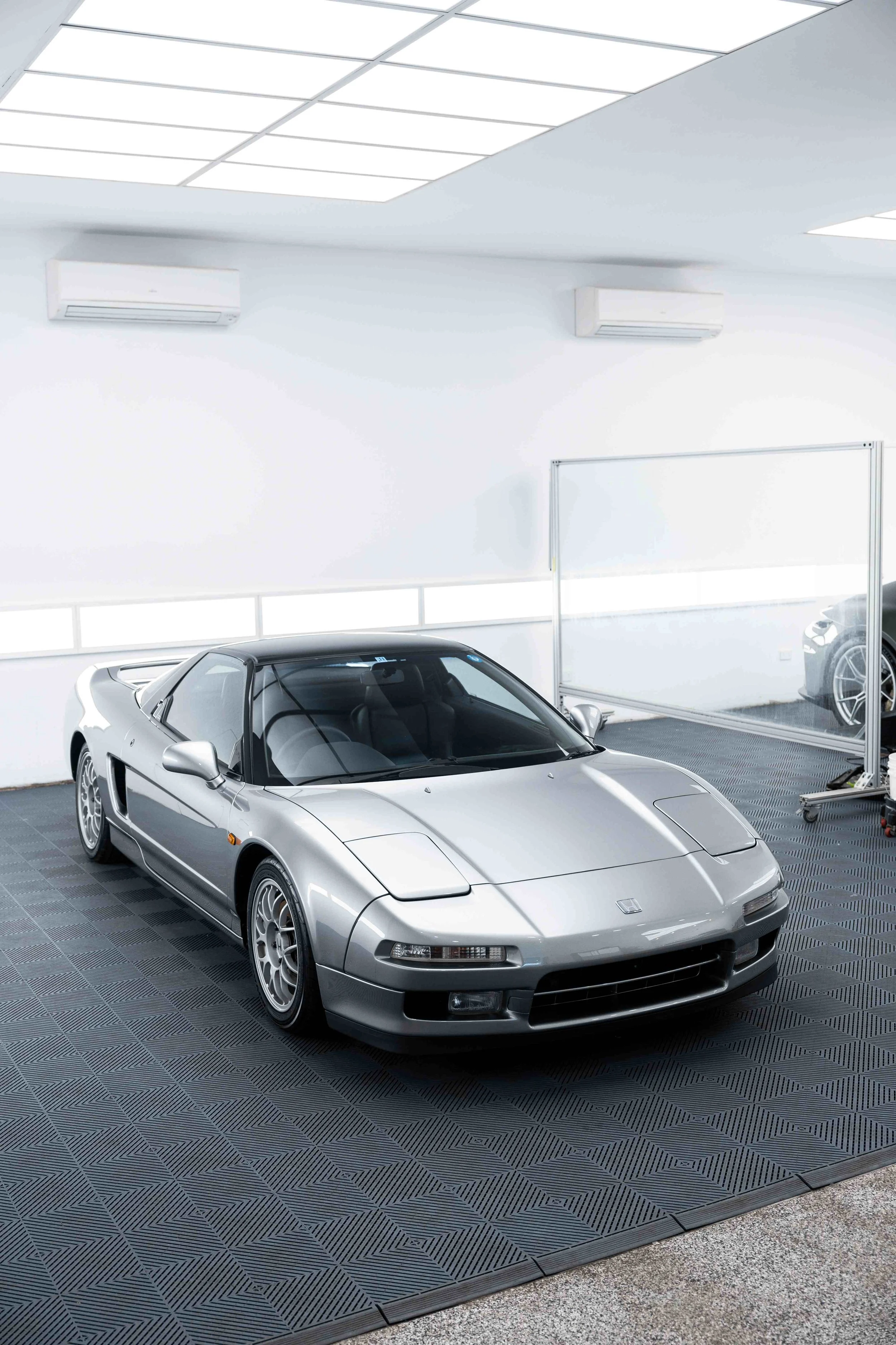 Silver Honda NSX in ADS detailing studio in Mona Vale