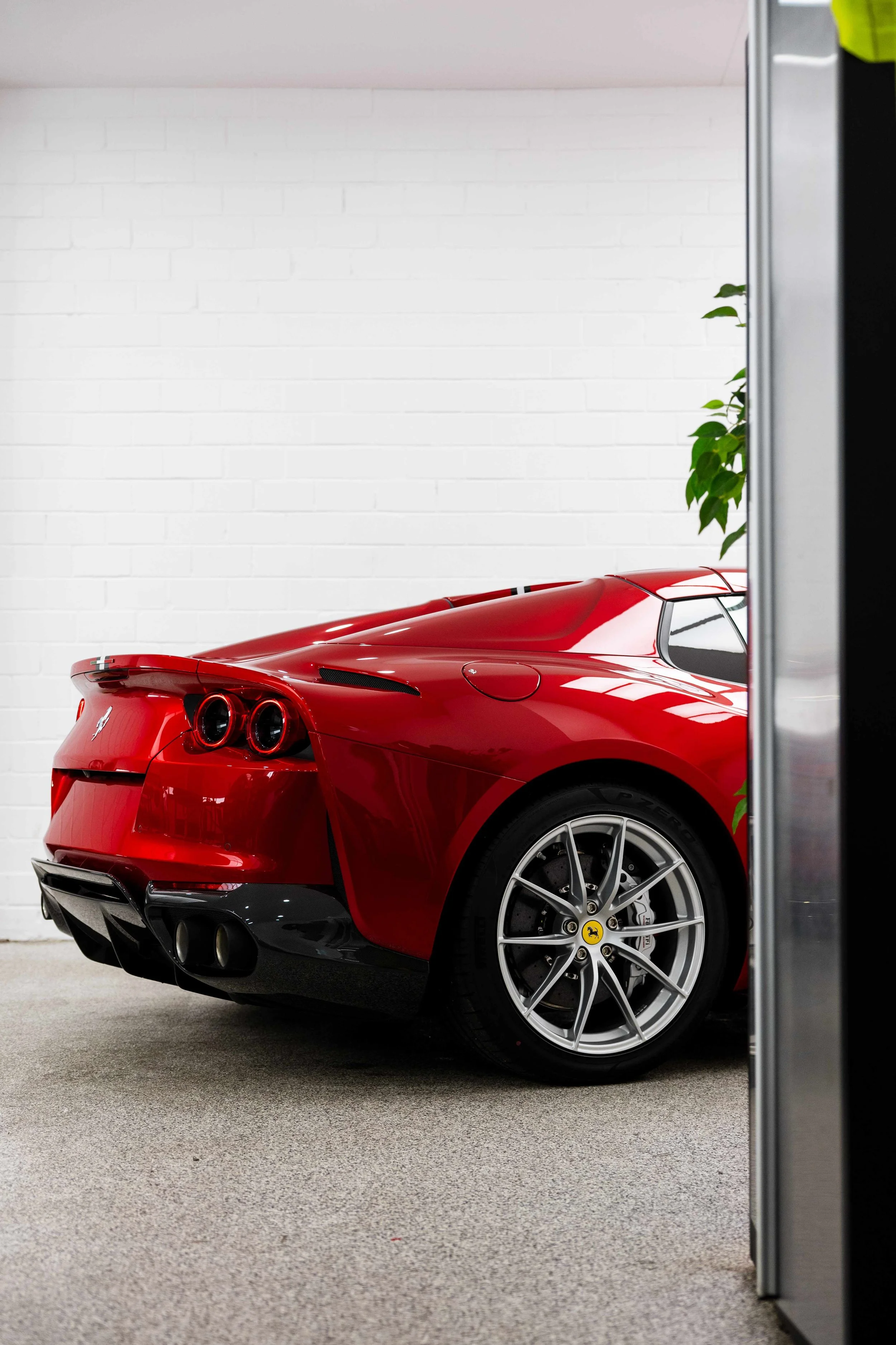 Red Ferrari 812 GTS rear quarter with XPEL Paint Protection Film in Sydney