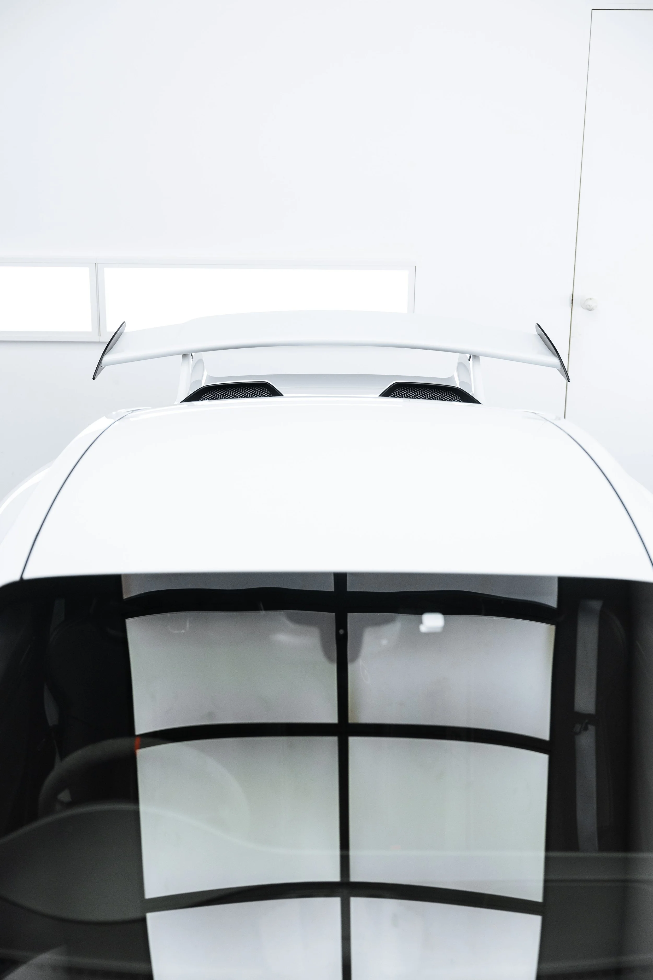 White Porsche GT3 roofline and rear wing with XPEL Paint Protection Film in Mona Vale