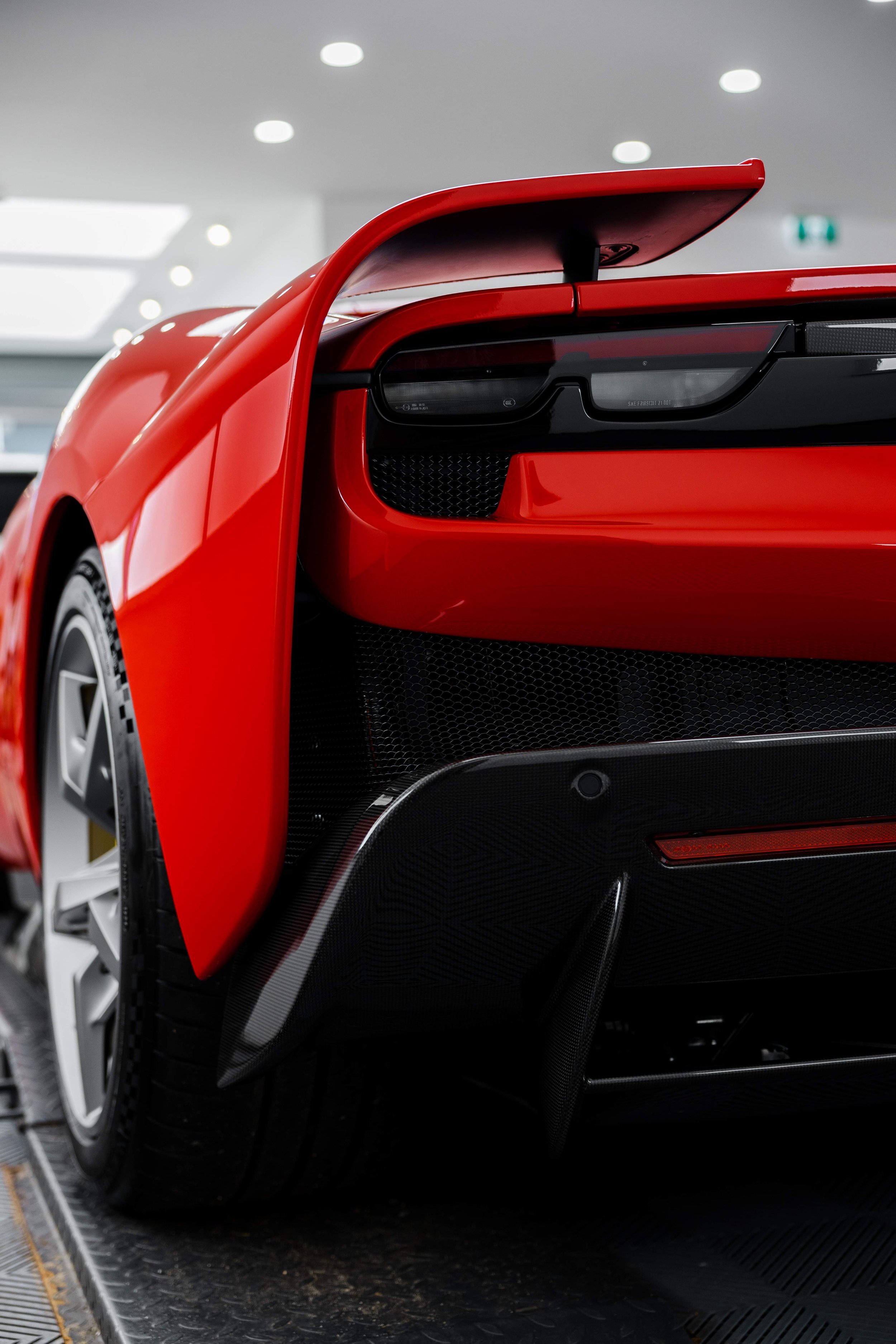 Red Ferrari 296 Speciale rear wing, taillight and carbon diffuser with XPEL Paint Protection Film in Mona Vale