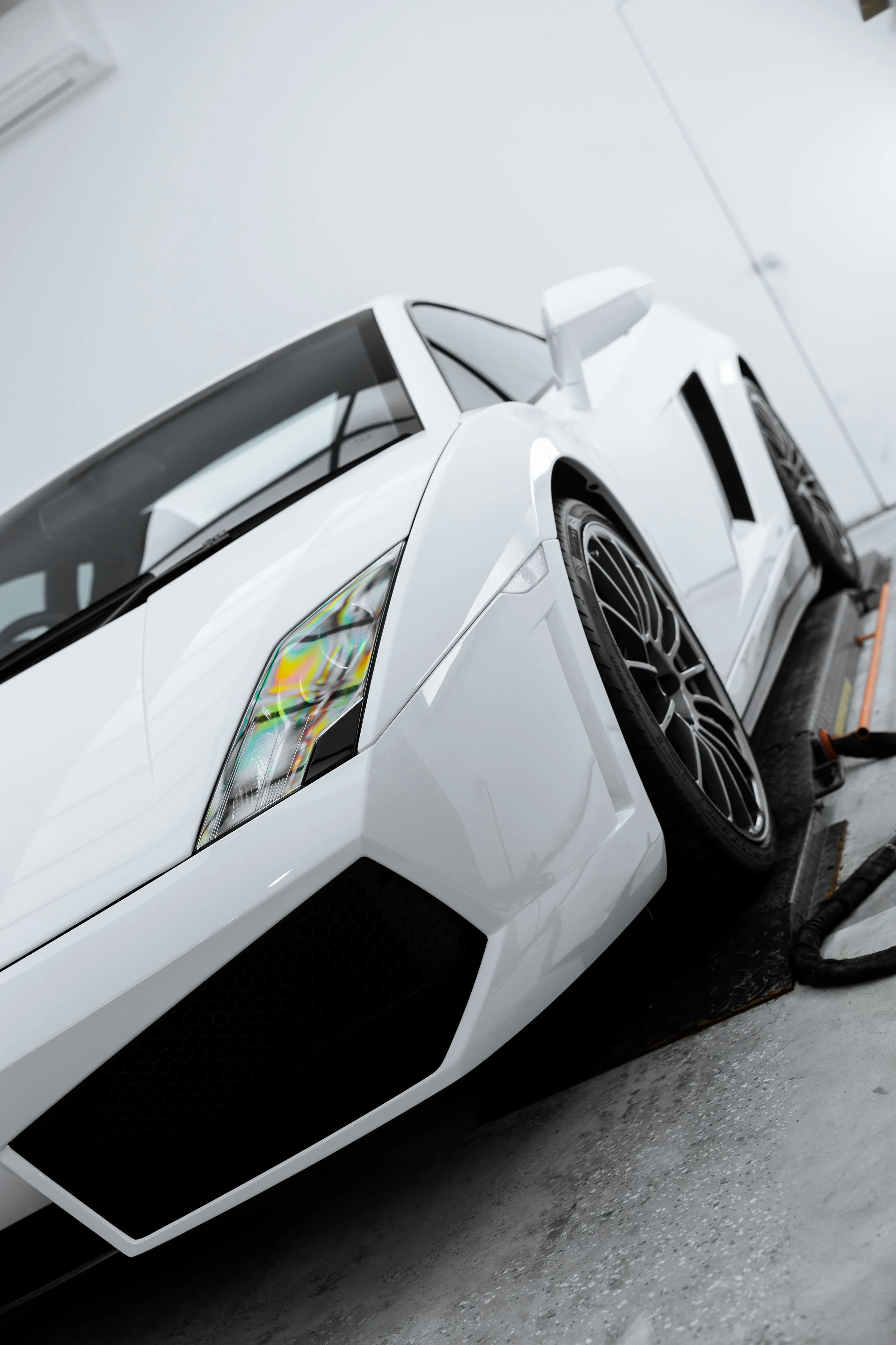 White Lamborghini Gallardo front quarter angle with full PPF by ADS in Mona Vale\