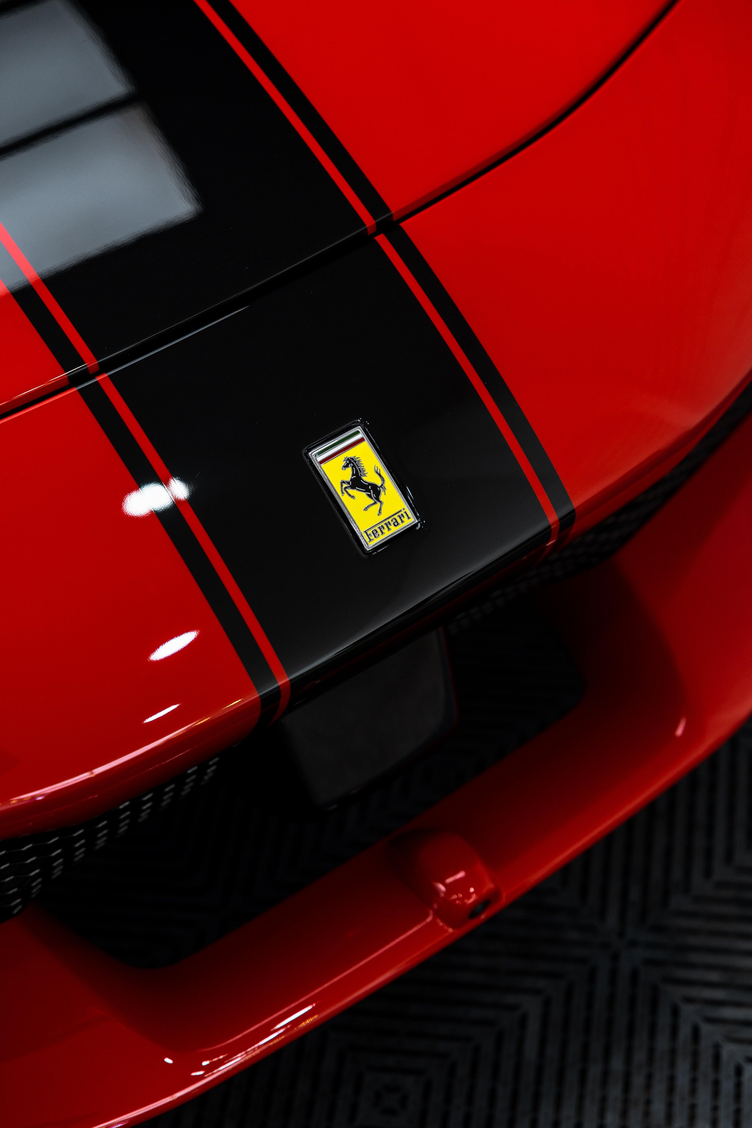 Red Ferrari 296 Speciale front bumper Prancing Horse badge on black stripe with XPEL Paint Protection Film in Sydney